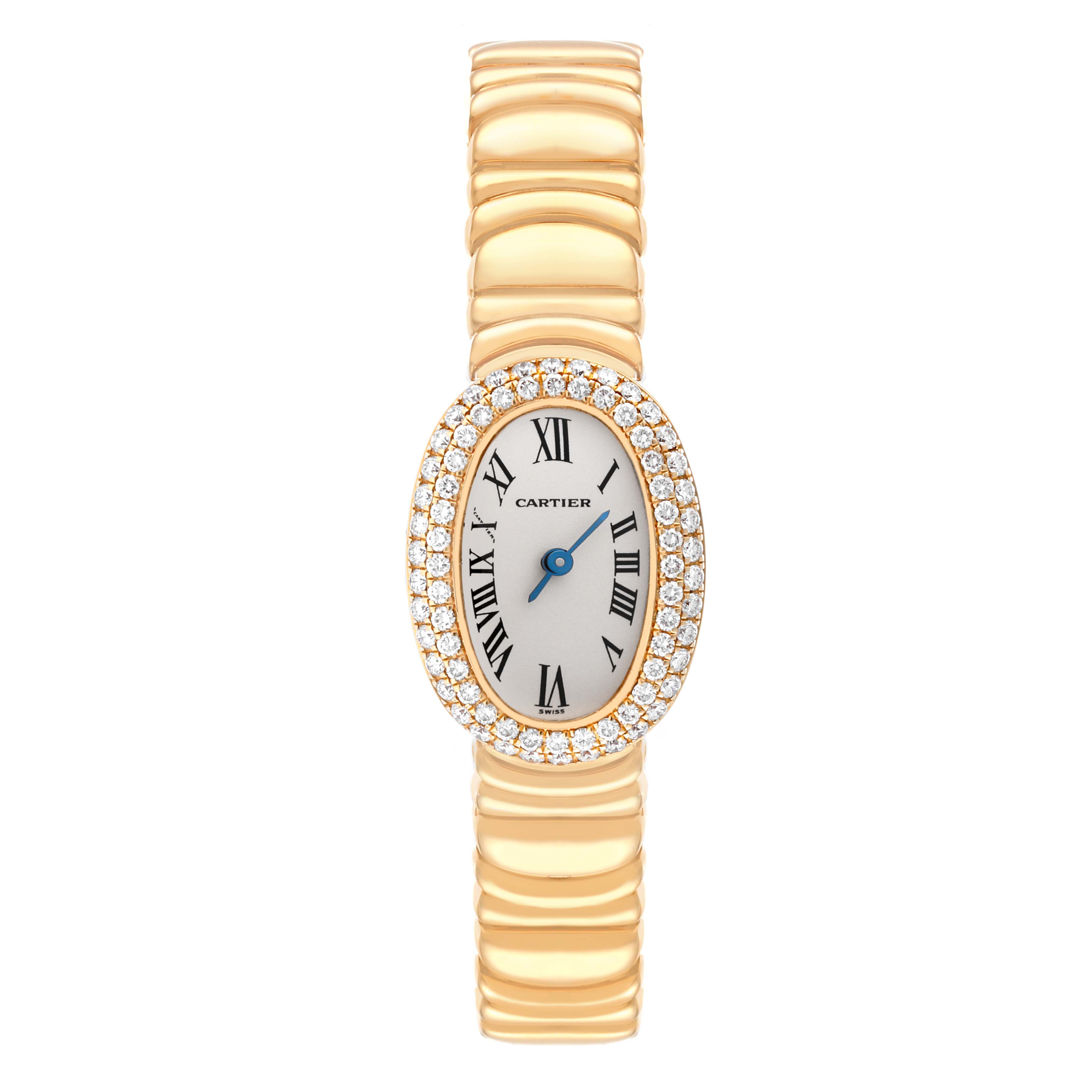 This image shows a Cartier Baignoire WB5094D8 Women's Yellow Gold Silver Dial WB5094D8 Women's Yellow Gold Silver Dial watch viewed from the front, highlighting its gold bracelet and diamond-encrusted bezel.