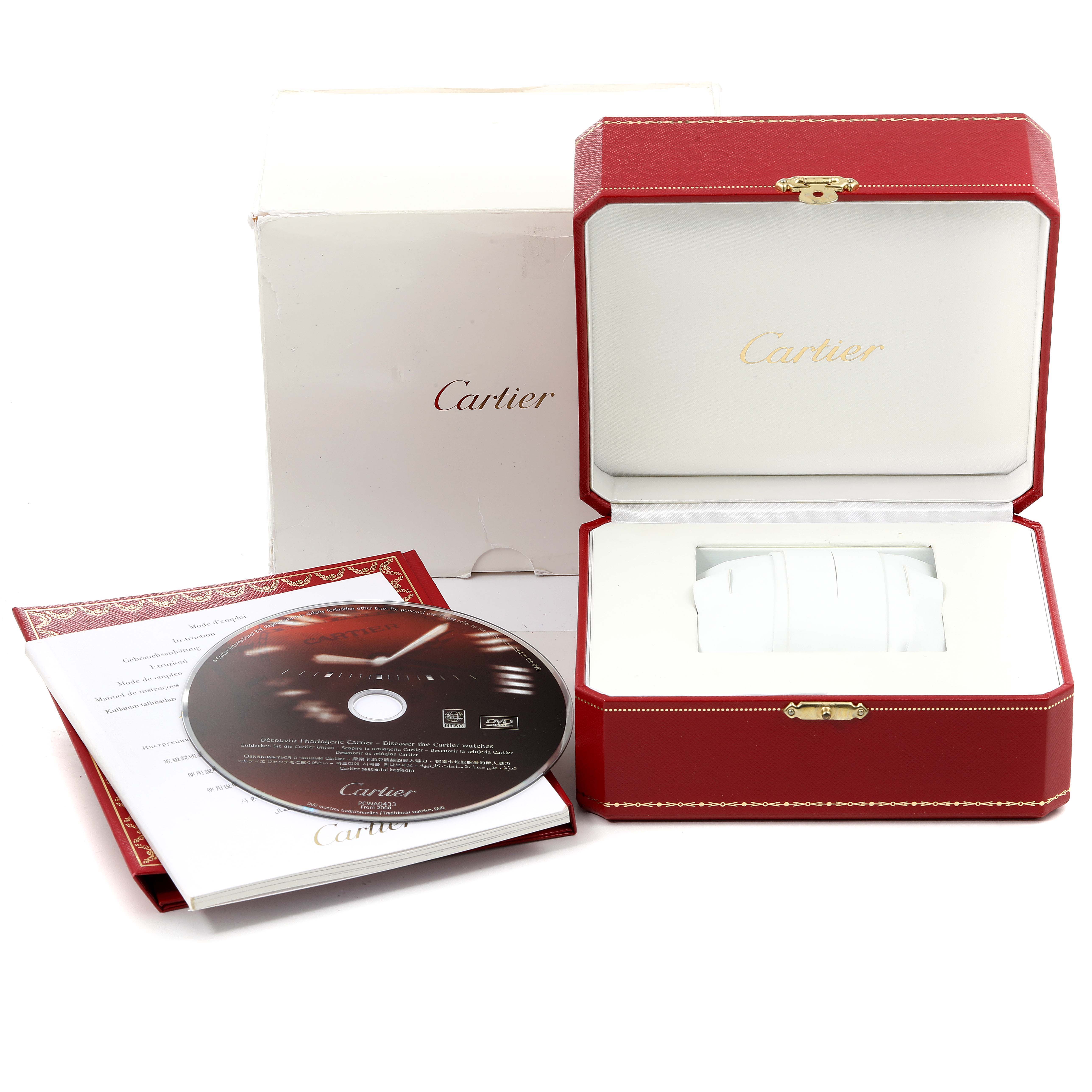 The image shows a Cartier Pasha W31074M7 Men's Stainless Steel White Dial W31074M7 Men's Stainless Steel White Dial watch box, booklet, and CD from a front angle.