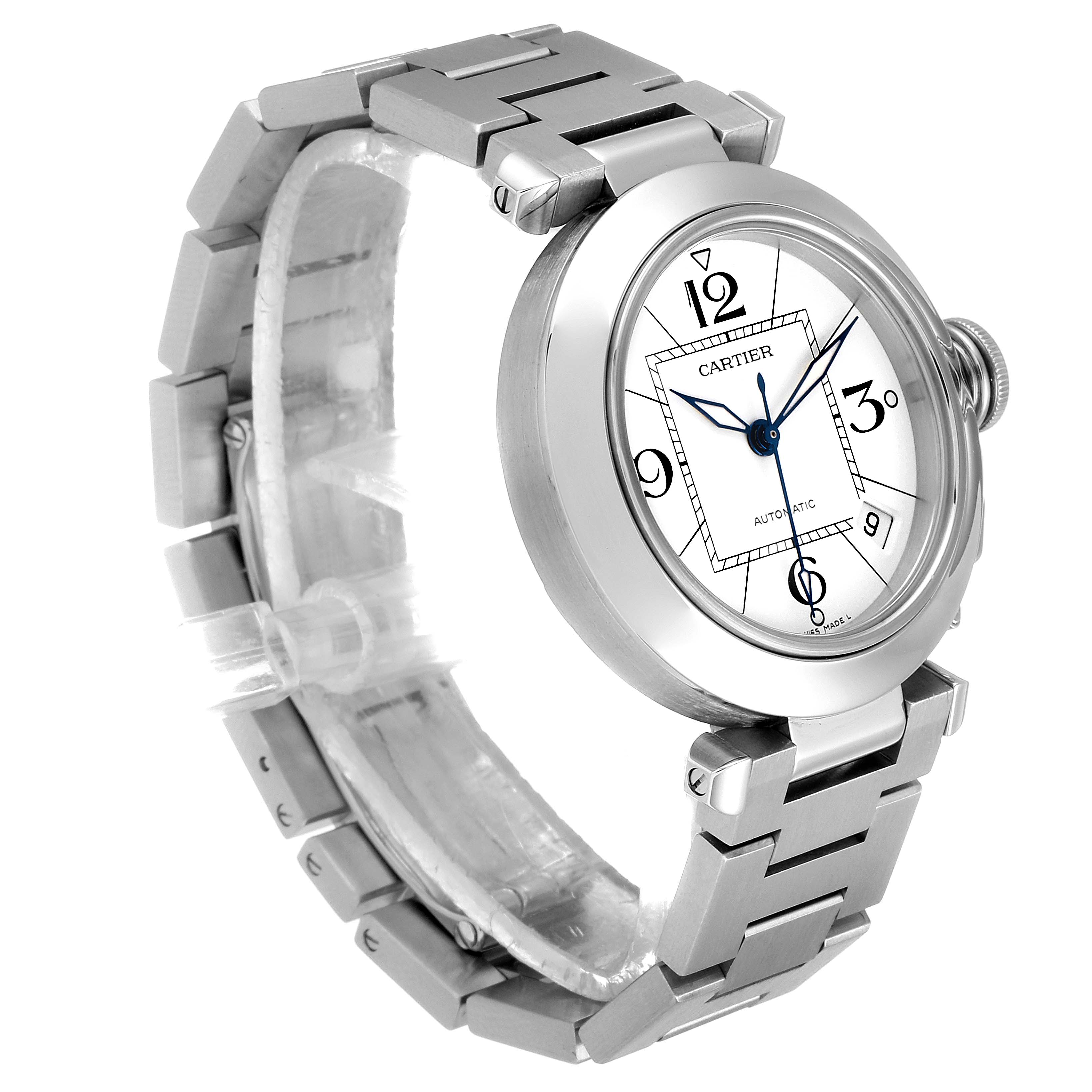 The image shows a side angle of the Cartier Pasha W31074M7 Men's Stainless Steel White Dial W31074M7 Men's Stainless Steel White Dial watch, highlighting its face, bezel, crown, and metal bracelet.