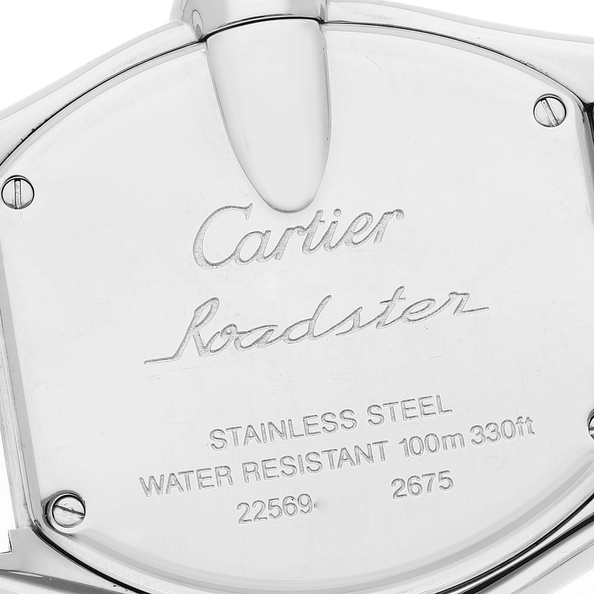 This image shows the back case of a Cartier Roadster W62016V3 Women's Stainless Steel Silver Dial W62016V3 Women's Stainless Steel Silver Dial watch, displaying its branding and specifications.