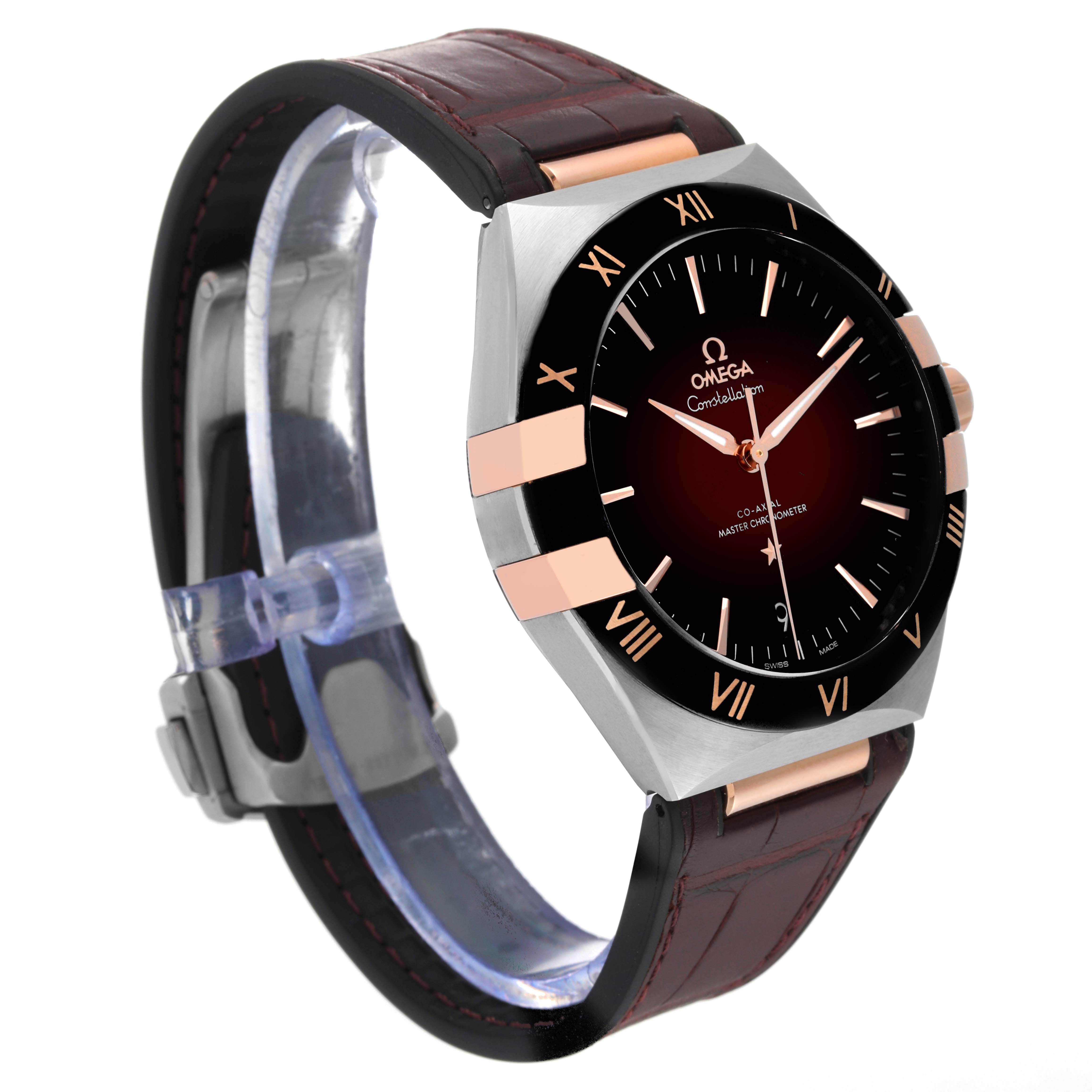 The image shows an Omega Constellation 131.23.41.21.11.001 Men's Steel and Gold (two tone) Red Dial 131.23.41.21.11.001 Men's Steel and Gold (two tone) Red Dial watch at a slight angle, highlighting the dial, bezel, case, and leather strap.