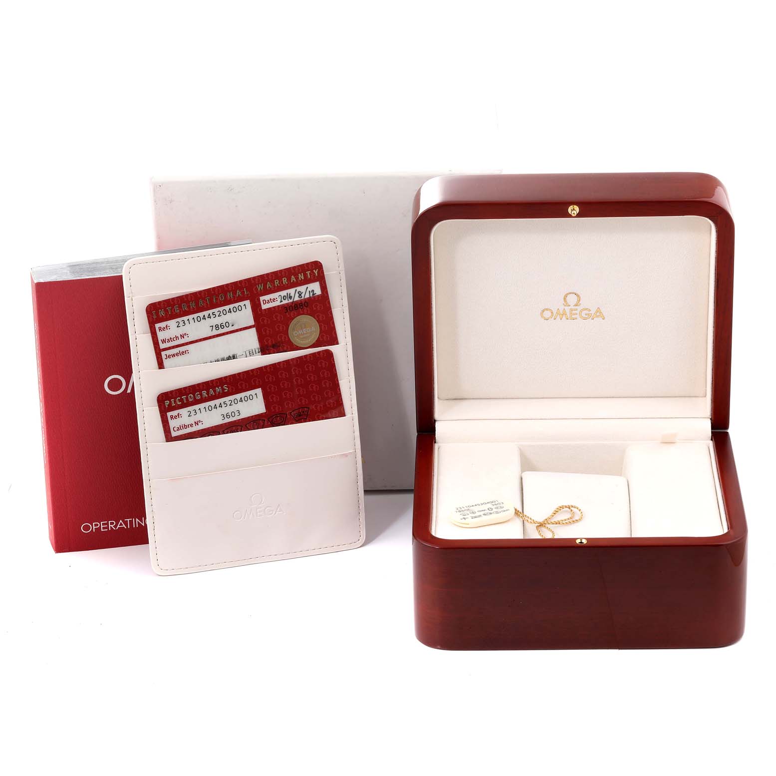 The image shows the packaging and warranty cards for the Omega Aqua Terra 231.10.44.52.04.001 Men
s Stainless Steel White Dial 231.10.44.52.04.001 Men
s Stainless Steel White Dial watch, including the red display box and white cardholder.