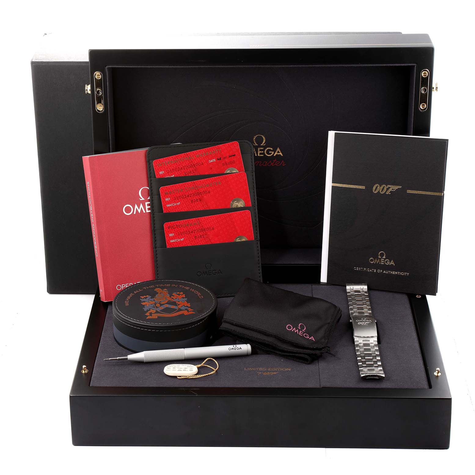 The image shows the Omega Seamaster 210.22.42.20.01.004 Men
s Stainless Steel Black Dial 210.22.42.20.01.004 Men
s Stainless Steel Black Dial watch box and accessories, including manuals, cards, a metal strap, a tool, and a cleaning cloth.