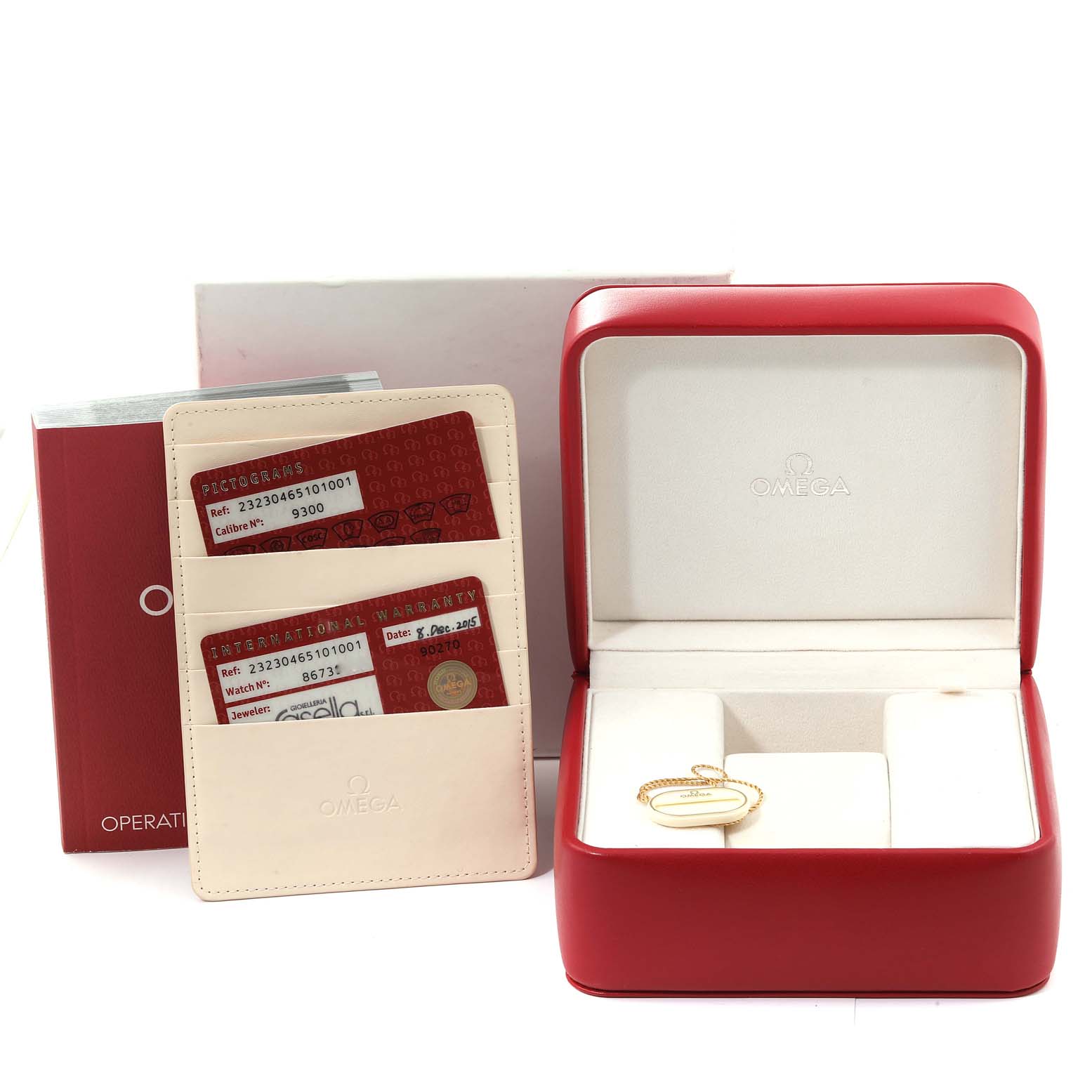 The image shows an Omega Planet Ocean 232.30.46.51.01.001 Men's Stainless Steel Black Dial 232.30.46.51.01.001 Men's Stainless Steel Black Dial watch box, warranty cards, and a ring inside the open watch box.