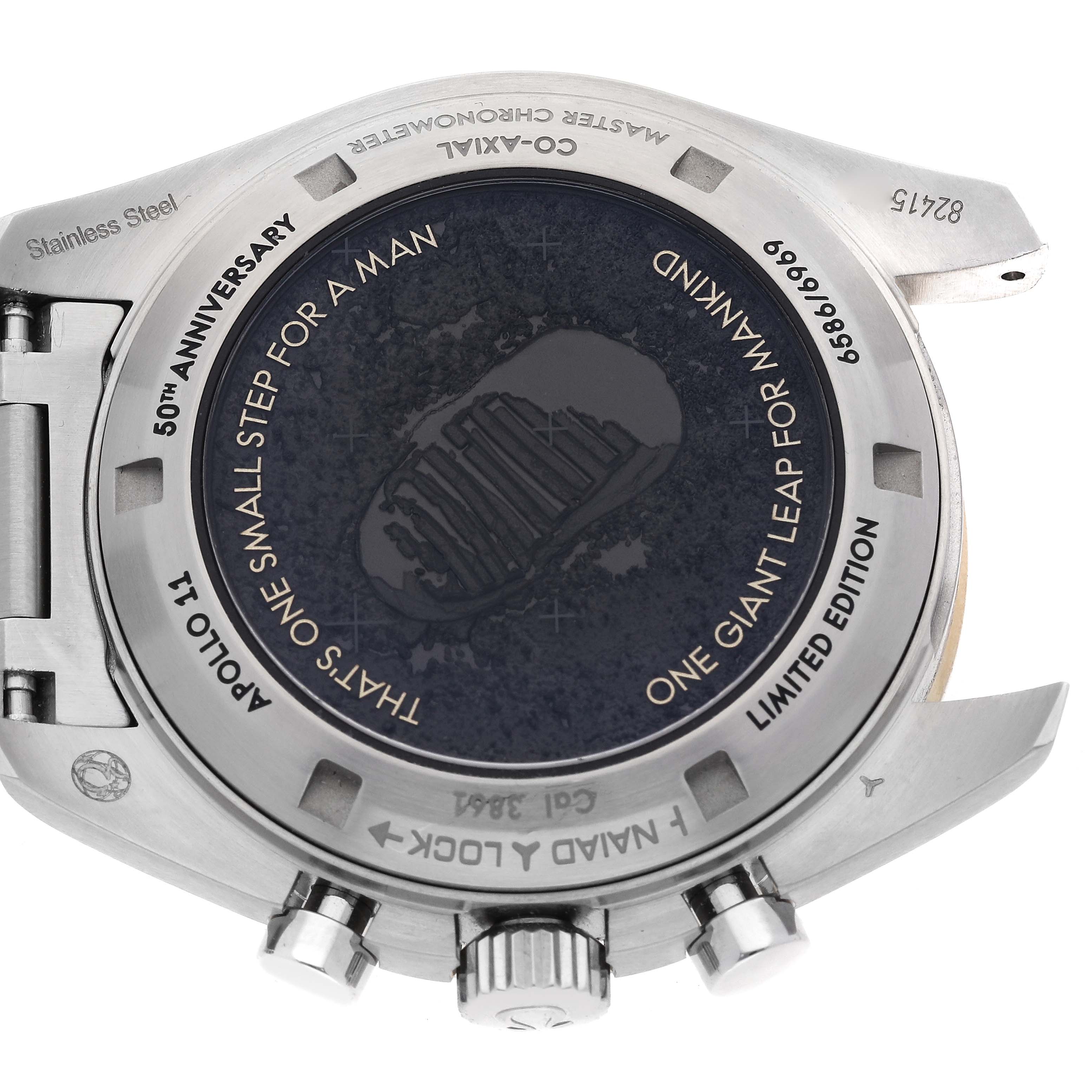 The Omega Speedmaster 310.20.42.50.01.001 Men's Stainless Steel Grey Dial 310.20.42.50.01.001 Men's Stainless Steel Grey Dial watch is shown from the back, featuring the engraved caseback and side pushers.