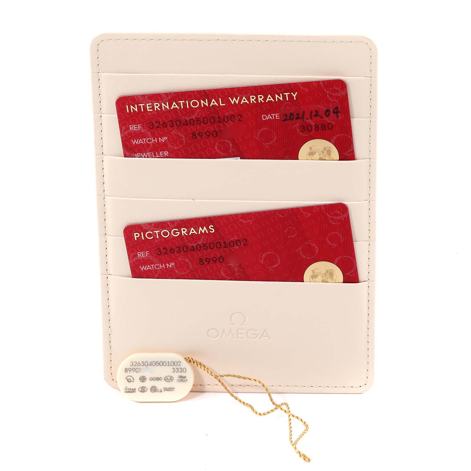 The image shows the international warranty cards and a pictogram card for the Omega Speedmaster 326.30.40.50.01.002 Men's Stainless Steel Black Dial 326.30.40.50.01.002 Men's Stainless Steel Black Dial watch in a leather cardholder.