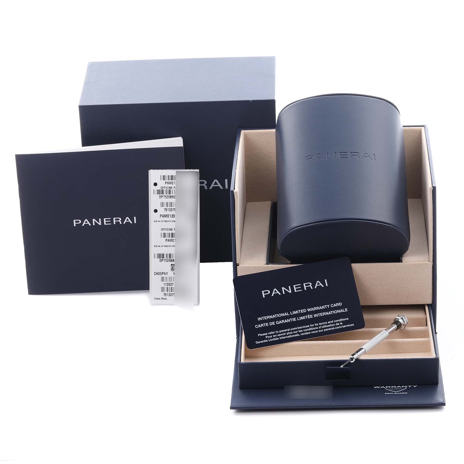 The image shows a Panerai Submersible PAM01391 Men's Stainless Steel Blue Dial PAM01391 Men's Stainless Steel Blue Dial watch box, warranty card, manual, and strap-changing tool from a slightly elevated angle.