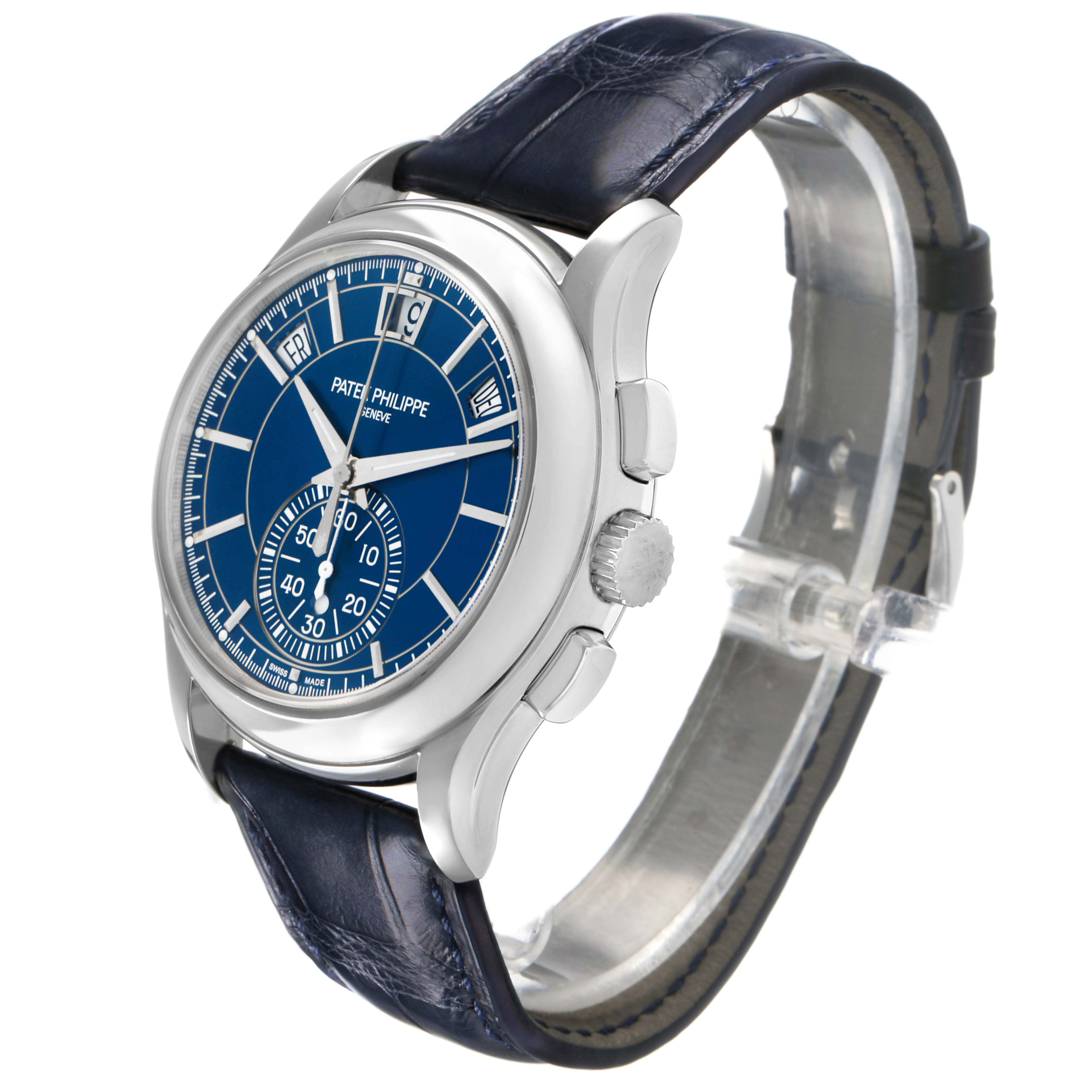 The Patek Philippe Complications 5905P - 001 Men's Platinum Blue Dial watch is shown from a three-quarter angle, highlighting the dial, case, and blue leather strap.