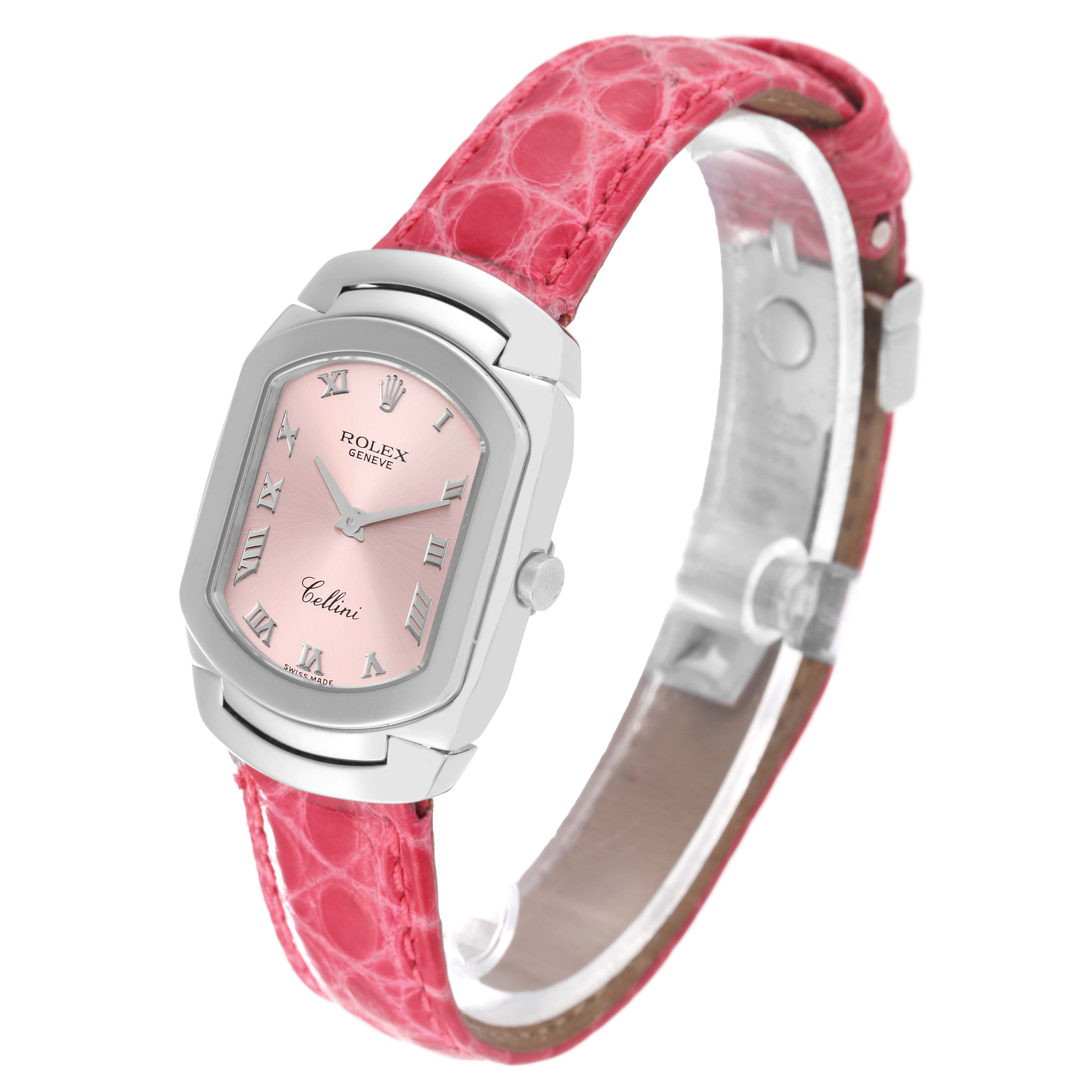 This image shows a Rolex Cellini 6631/9 Women's White Gold Pink Dial 6631/9 Women's White Gold Pink Dial watch at a slight angle, highlighting its pink dial and red leather strap.