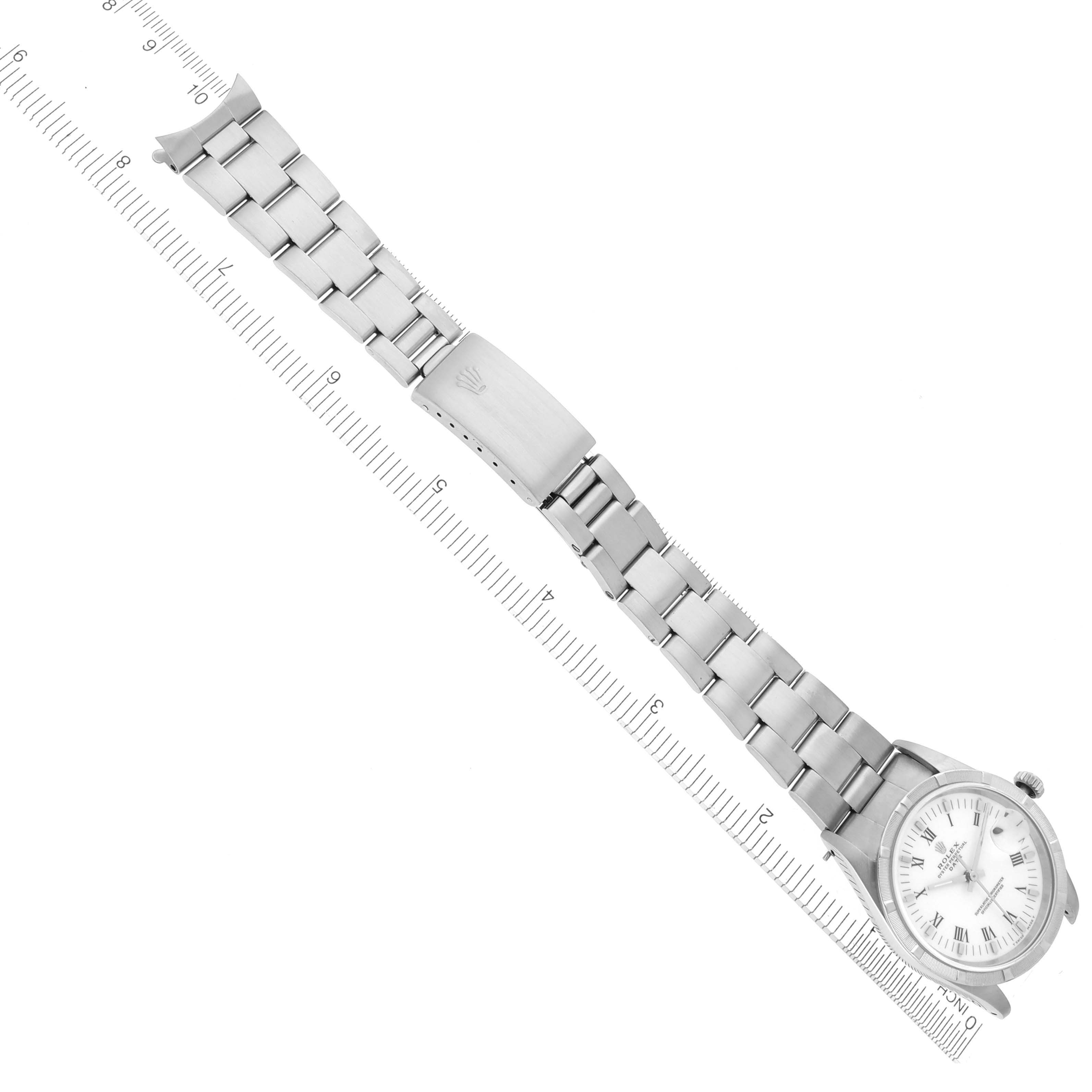 The Rolex Date 15210 Men's Stainless Steel White Dial 15210 Men's Stainless Steel White Dial watch is shown from a top-down angle, displaying its entire bracelet and clasp along with the face.