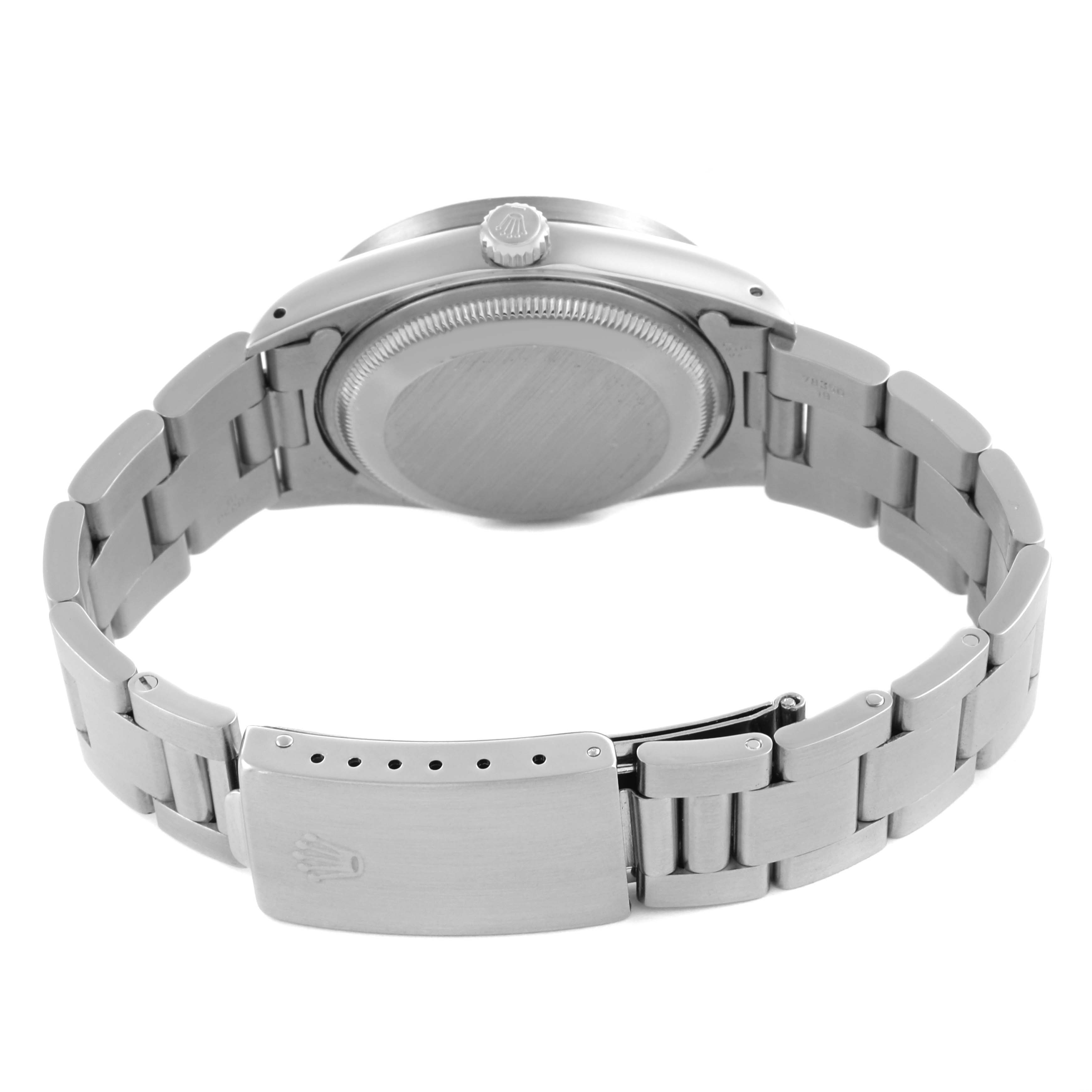 The image shows the back view of a Rolex Date 15210 Men's Stainless Steel White Dial 15210 Men's Stainless Steel White Dial watch, highlighting the case back, bracelet, and clasp.