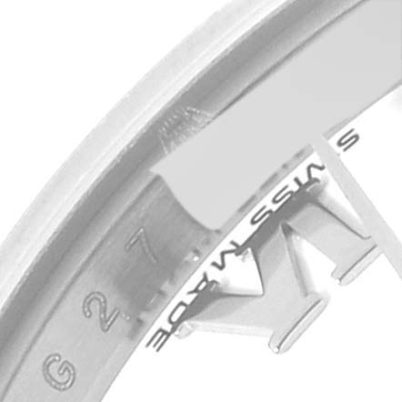 This image shows a close-up of the inner bezel and part of the case of a Rolex Datejust 179160 Women's Stainless Steel White Dial 179160 Women's Stainless Steel White Dial watch, highlighting the serial number and "Swiss Made" inscription.