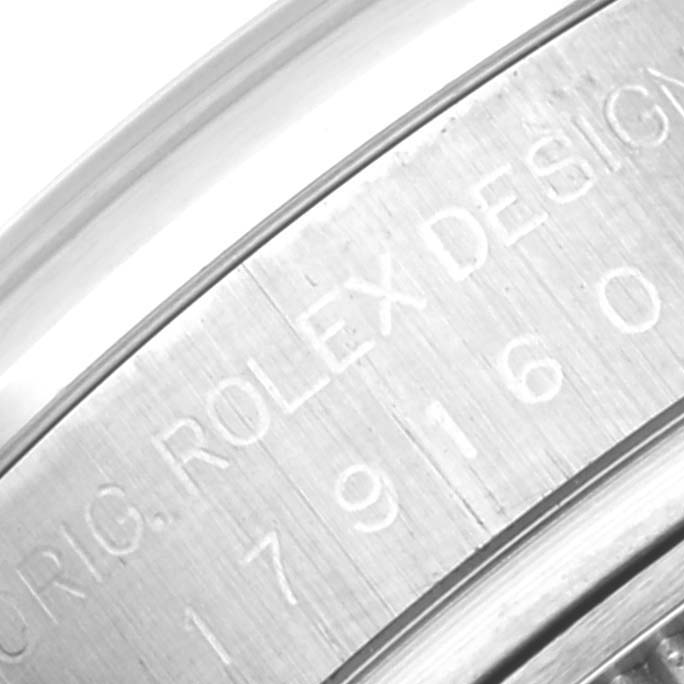 This close-up image shows the inner part of the bezel and case engraving of a Rolex Datejust 179160 Women's Stainless Steel White Dial 179160 Women's Stainless Steel White Dial watch.