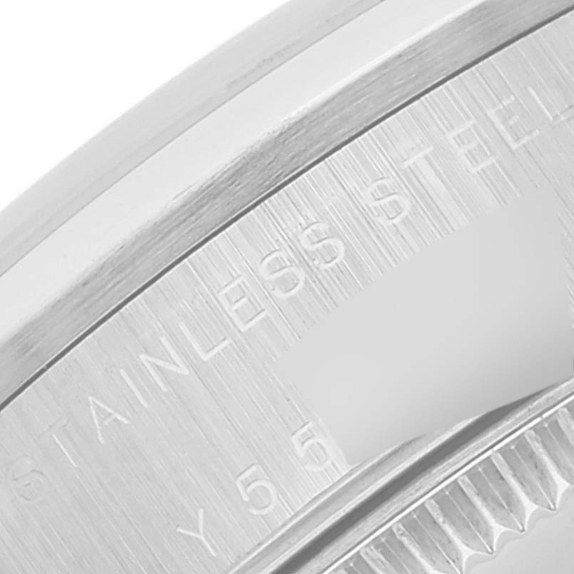 The image shows a close-up view of the case back of a Rolex Mid-Size 78240 Women's Stainless Steel Silver Dial 78240 Women's Stainless Steel Silver Dial model, highlighting the "STAINLESS STEEL" engraving.