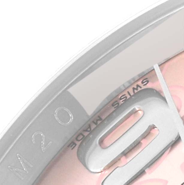 The image shows a close-up of the dial and part of the numeral markers of a Rolex Datejust 116200 Men's Stainless Steel Pink Dial 116200 Men's Stainless Steel Pink Dial watch.