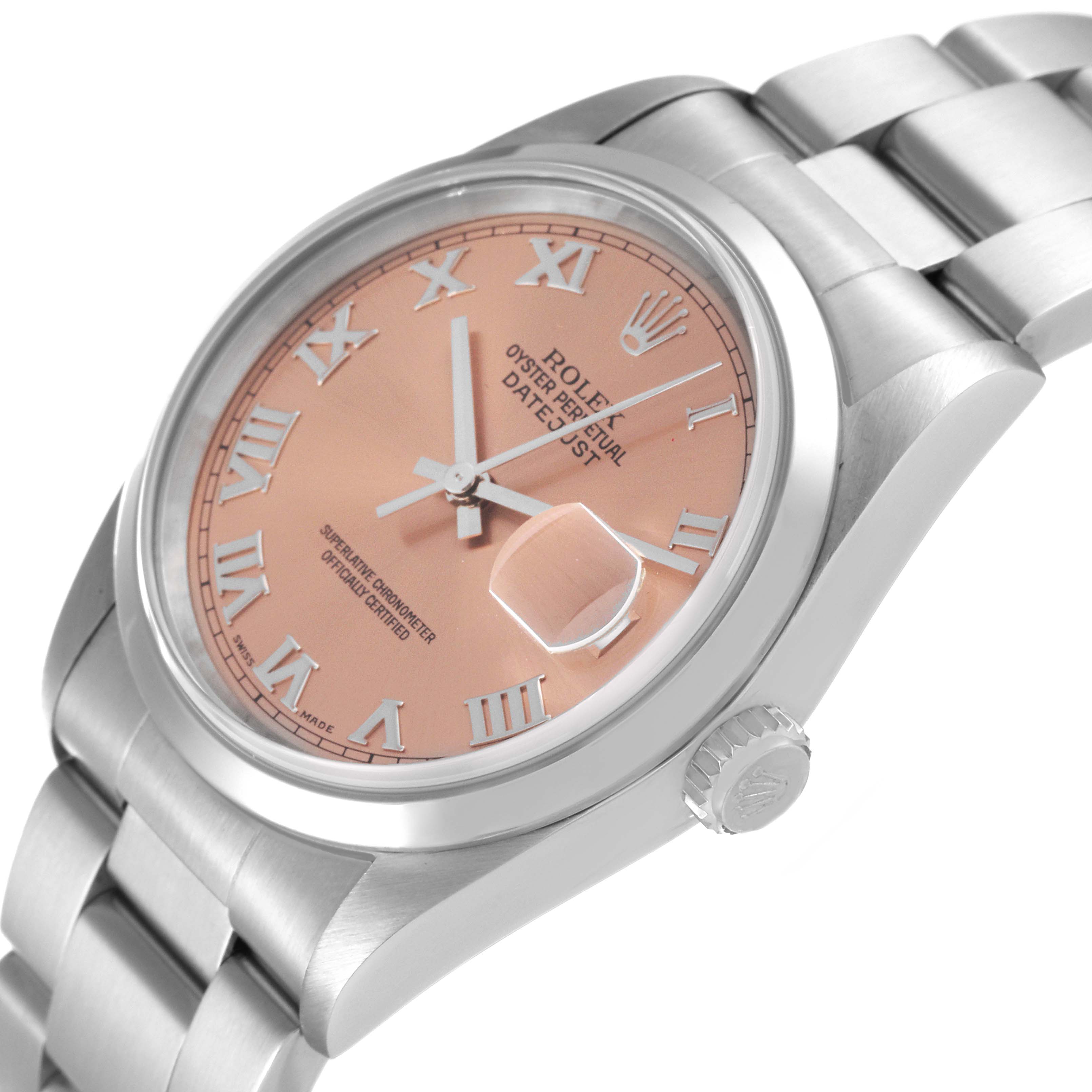 The image shows a close-up, angled view of a Rolex Datejust 16200 Men's Stainless Steel Pink Dial 16200 Men's Stainless Steel Pink Dial watch featuring a pink dial and Roman numerals.