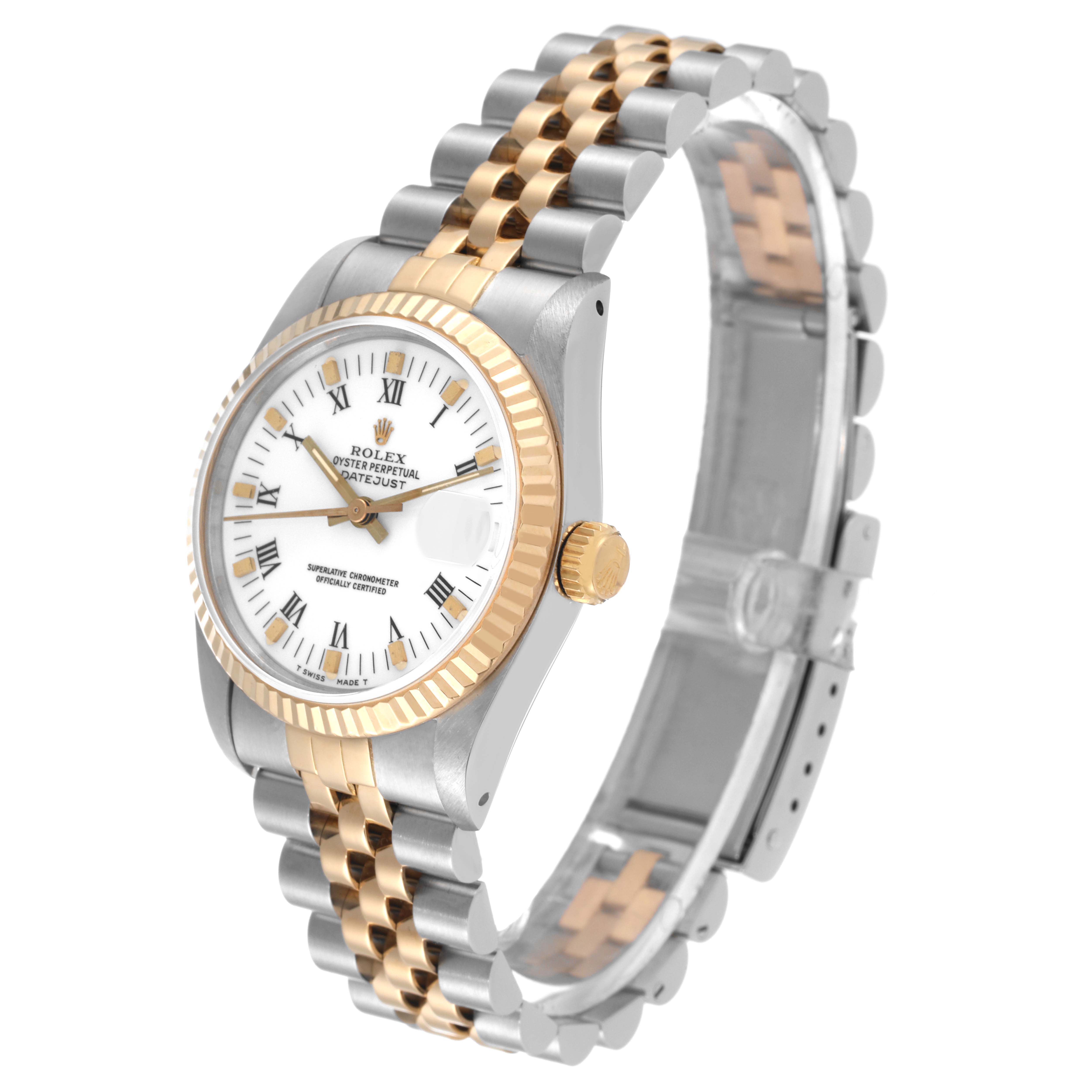 This image shows a side angle of the Rolex Mid-Size 68273 Women
s Steel and Gold (two tone) White Dial 68273 Women
s Steel and Gold (two tone) White Dial Datejust watch, highlighting the dial, bezel, crown, and two-tone bracelet.