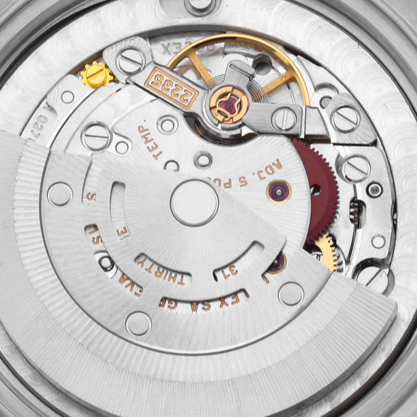 The image shows a close-up view of the movement mechanism inside a Rolex Mid-Size 78273 Women's Steel and Gold (two tone) Black Dial 78273 Women's Steel and Gold (two tone) Black Dial watch, highlighting gears and the rotor.