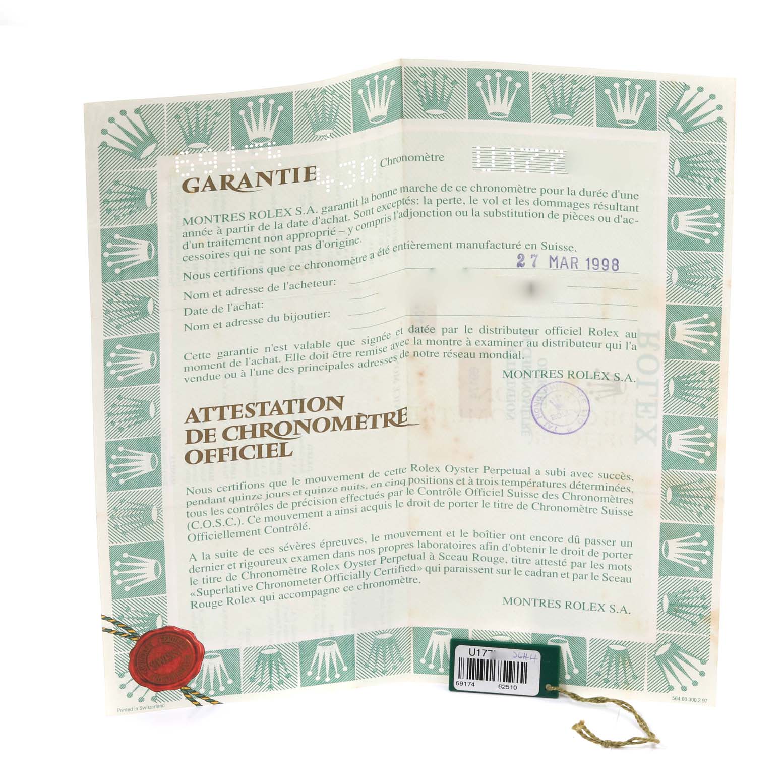 This image shows the warranty and certification papers for a Rolex Datejust 69174 Women's Stainless Steel Blue Dial 69174 Women's Stainless Steel Blue Dial watch, photographed from a straight-on angle.