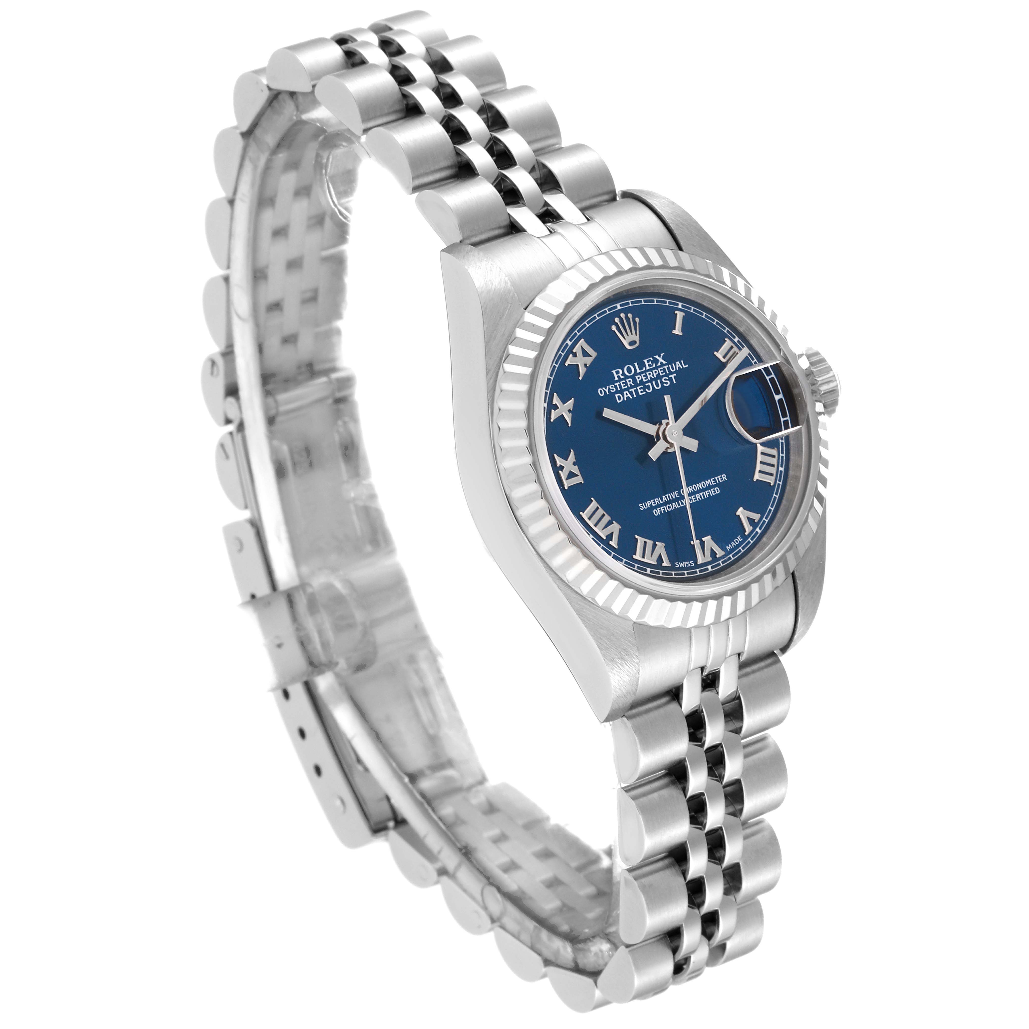 This image shows a Rolex Datejust 69174 Women's Stainless Steel Blue Dial 69174 Women's Stainless Steel Blue Dial watch at a three-quarter angle, highlighting its blue dial, fluted bezel, and Jubilee bracelet.