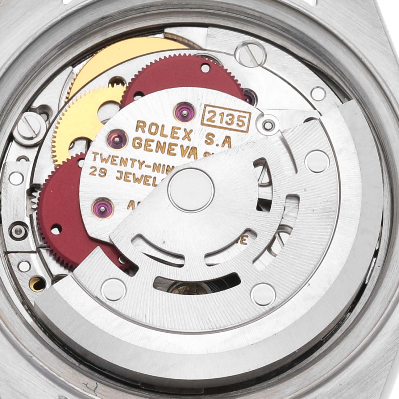 This image shows an up-close view of the Rolex Datejust 69174 Women's Stainless Steel Blue Dial 69174 Women's Stainless Steel Blue Dial model's automatic movement mechanism from the caseback.