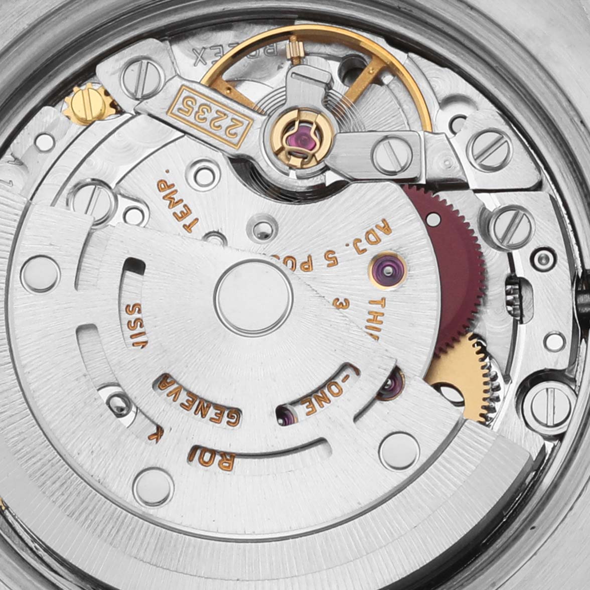 The image shows the movement mechanism of a Rolex Datejust 179174 Women's Stainless Steel Blue Dial 179174 Women's Stainless Steel Blue Dial watch from a top-down angle, highlighting gears and components.
