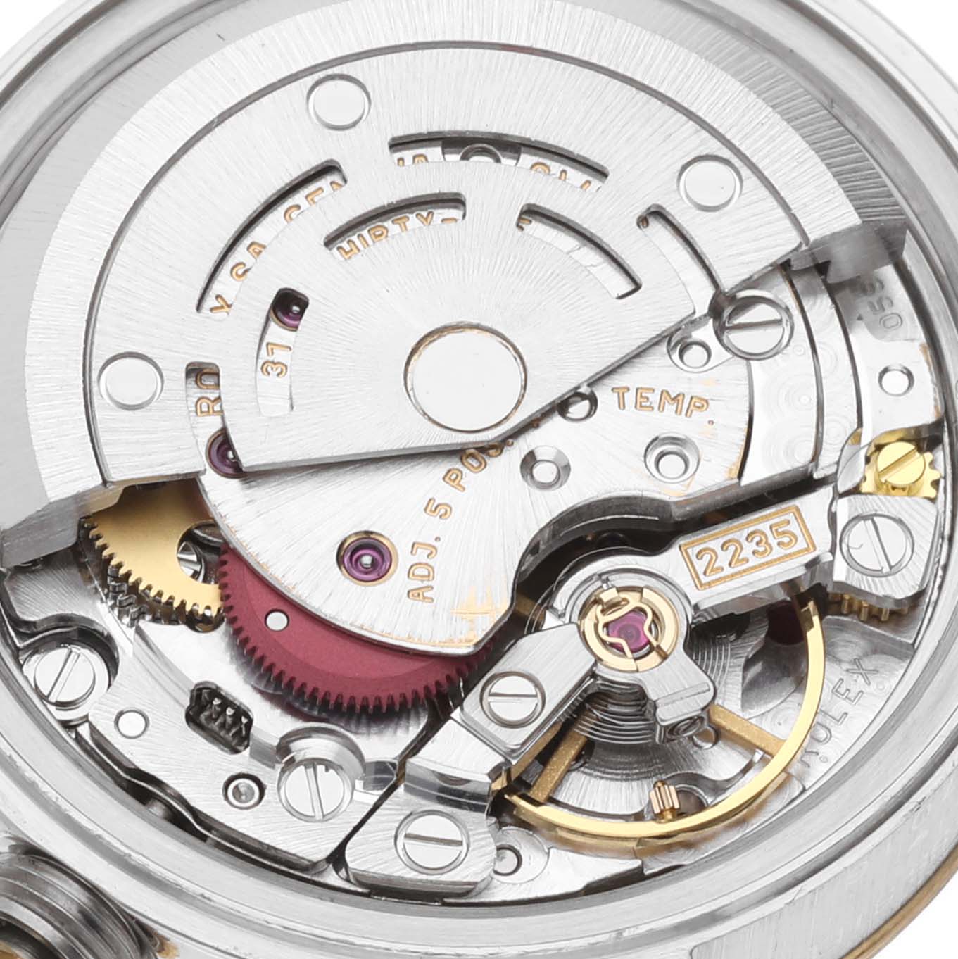 This image shows a close-up of the movement mechanism inside a Rolex Datejust 79173 Women's Steel and Gold (two tone) White Dial 79173 Women's Steel and Gold (two tone) White Dial watch.