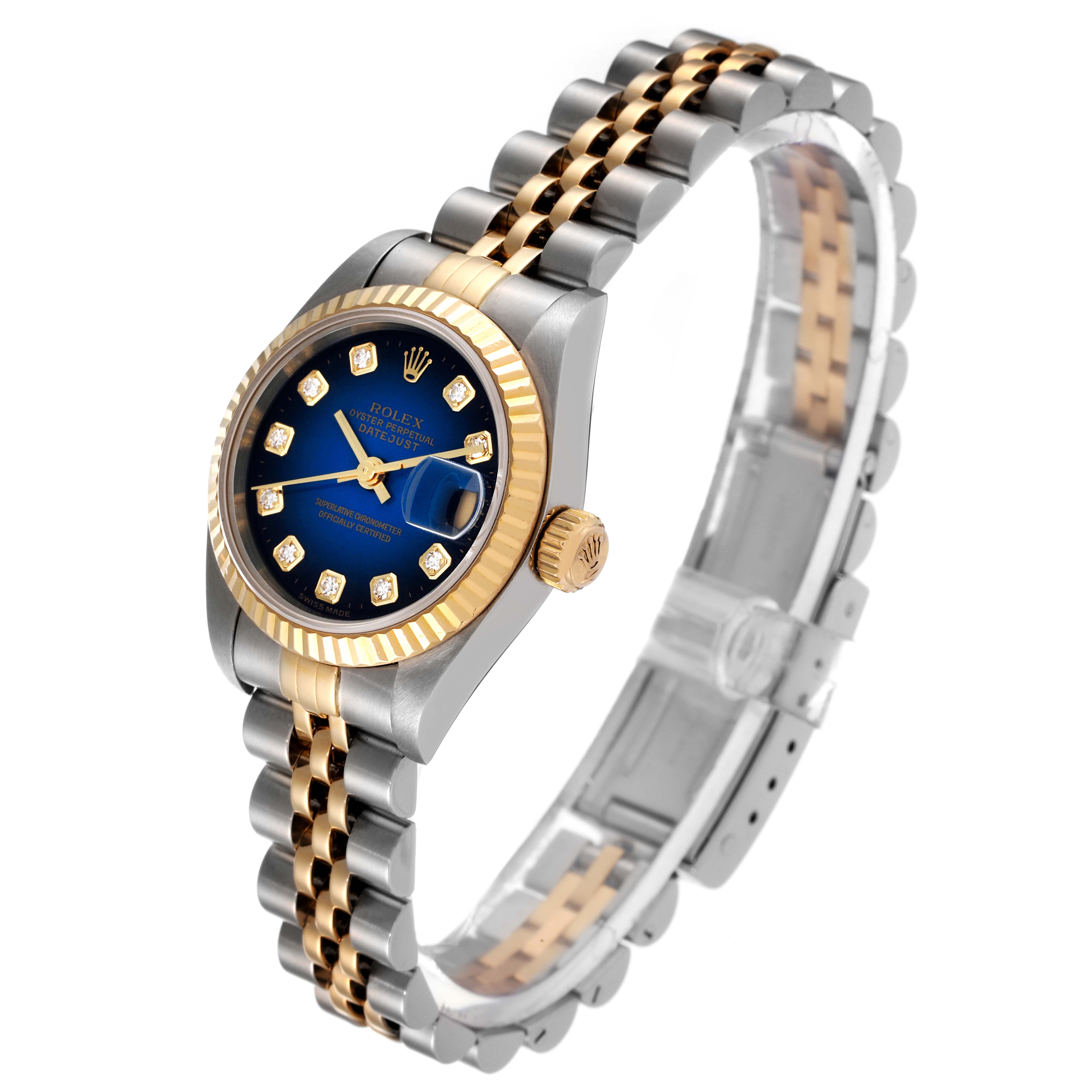 The image shows a side angle of a Rolex Datejust 79173 Women's Steel and Gold (two tone) Blue Dial 79173 Women's Steel and Gold (two tone) Blue Dial watch, focusing on the dial, bezel, crown, and bracelet.