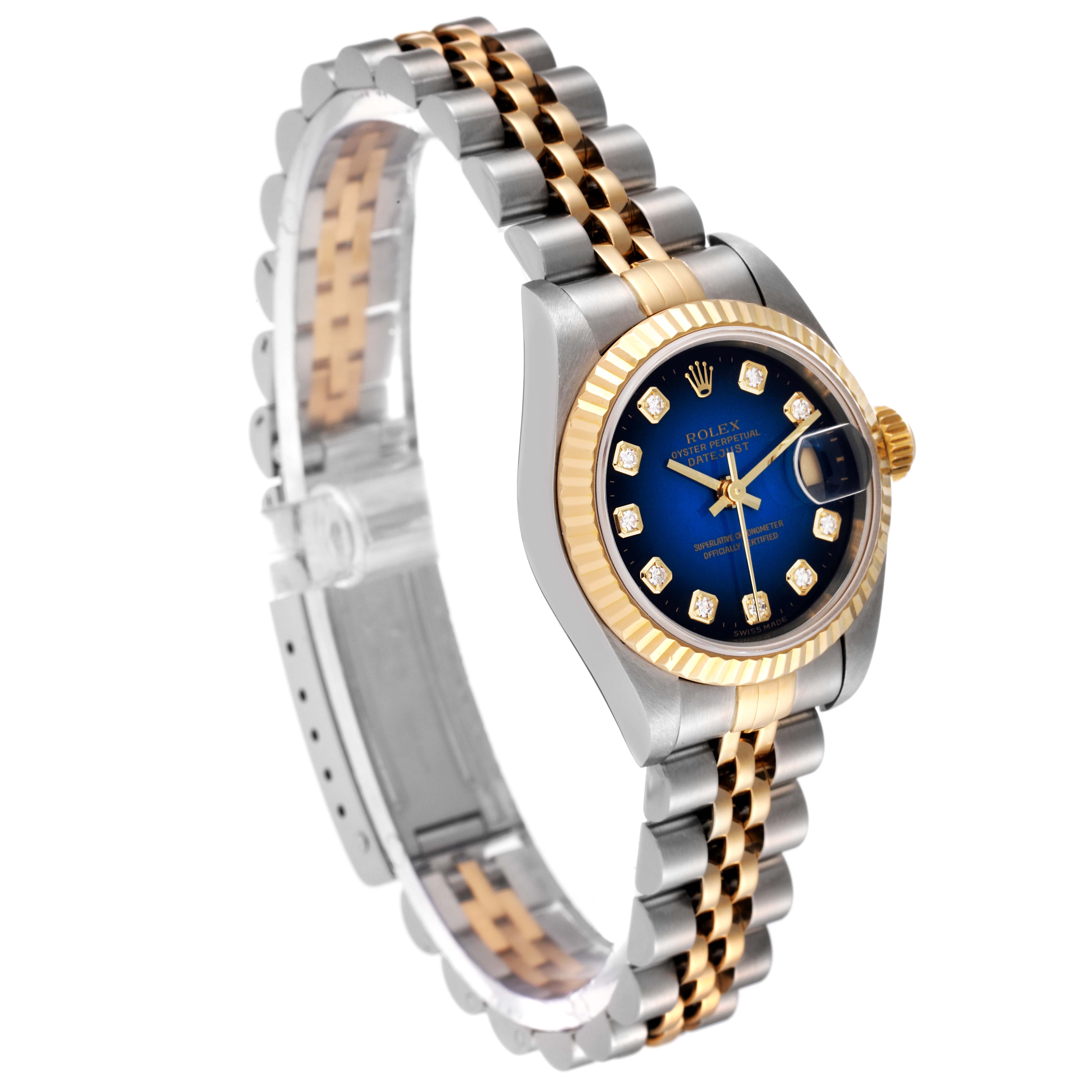 The Rolex Datejust 79173 Women's Steel and Gold (two tone) Blue Dial 79173 Women's Steel and Gold (two tone) Blue Dial watch is shown at an angle displaying the face, bezel, crown, and two-tone bracelet.