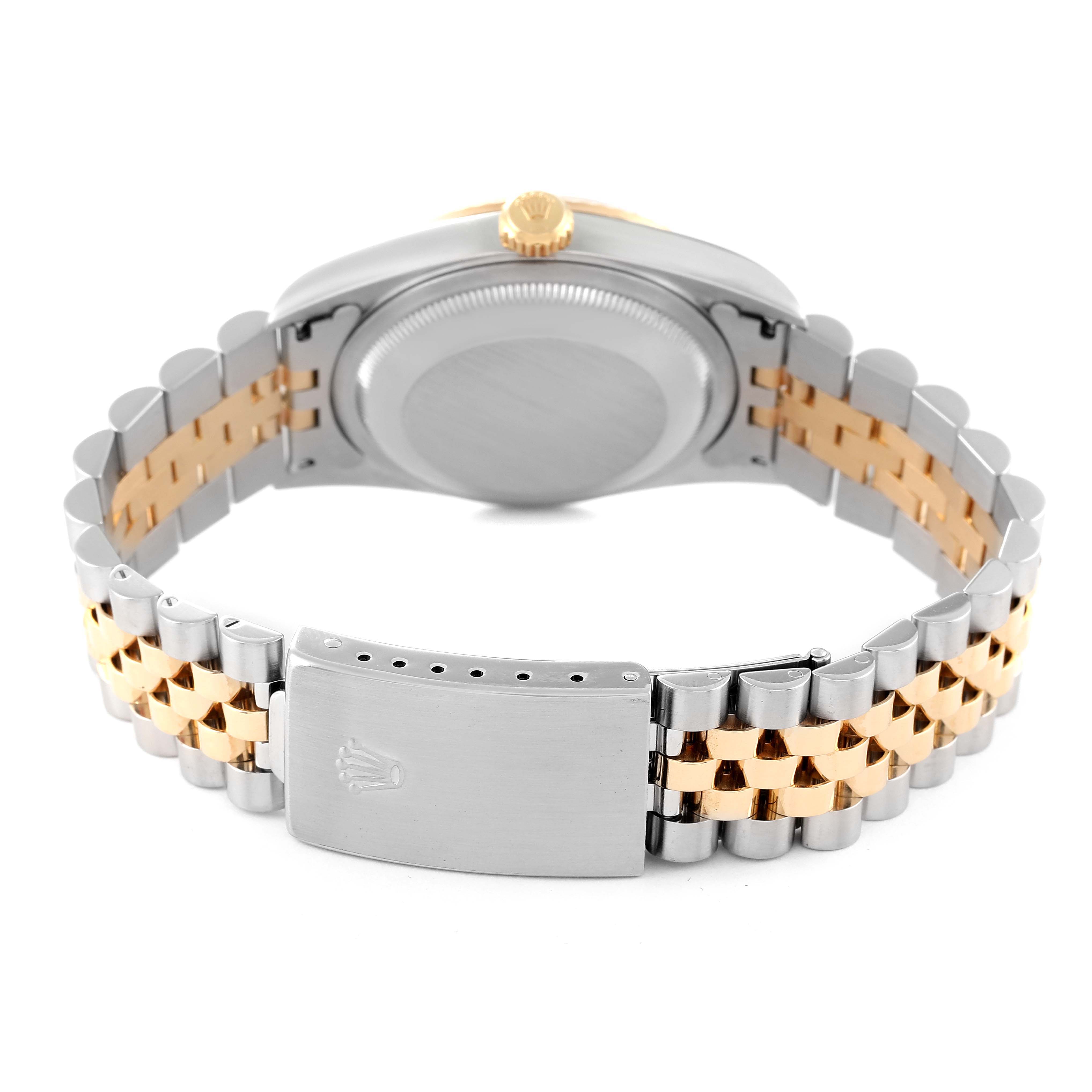 The image shows the backside of a Rolex Datejust 16233 Men's Steel and Gold (two tone) Champagne Dial 16233 Men's Steel and Gold (two tone) Champagne Dial watch, highlighting its two-tone bracelet and clasp.