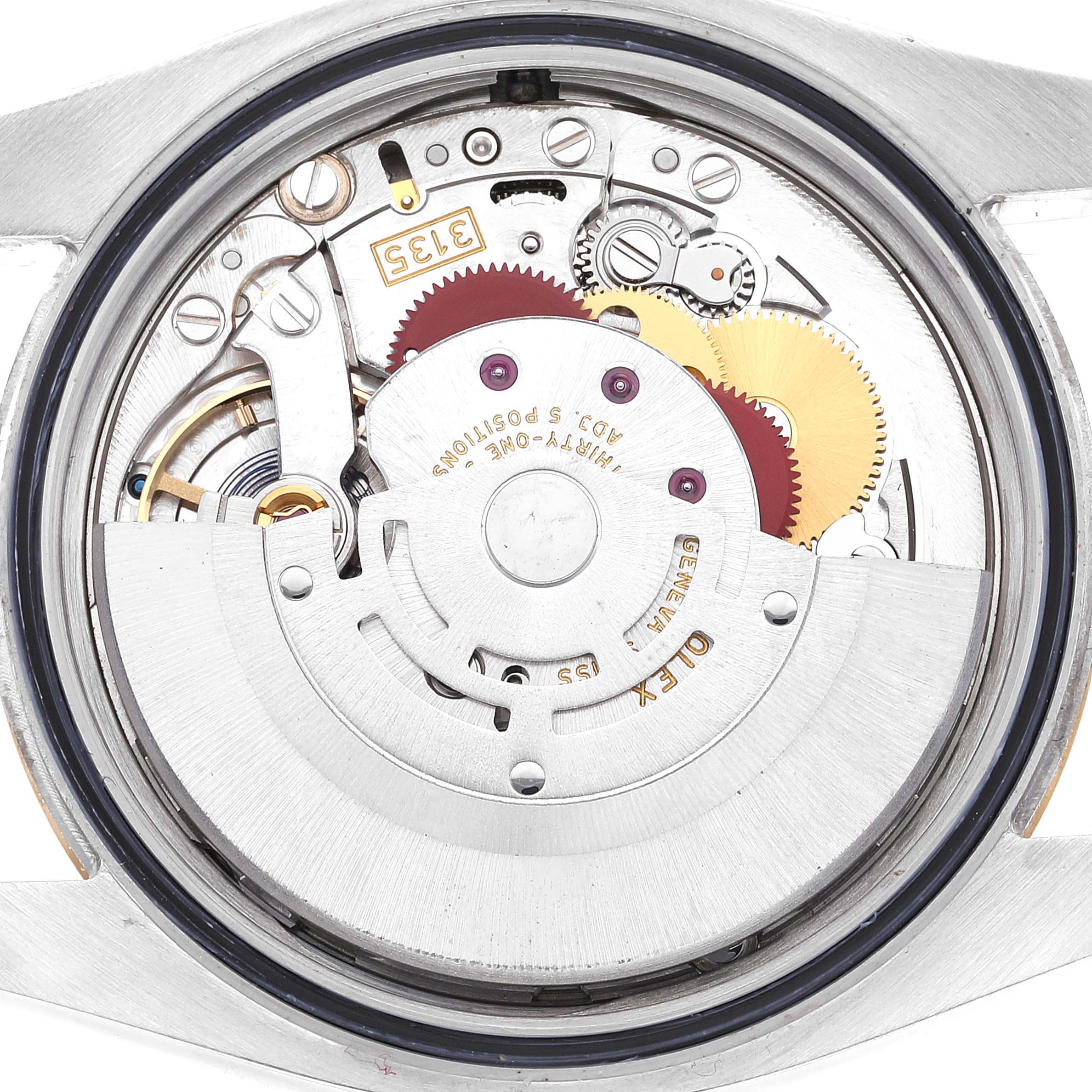 This image shows the inner mechanism and movement parts of a Rolex Datejust 116233 Men's Steel and Gold (two tone) Silver Dial 116233 Men's Steel and Gold (two tone) Silver Dial watch from a back angle.