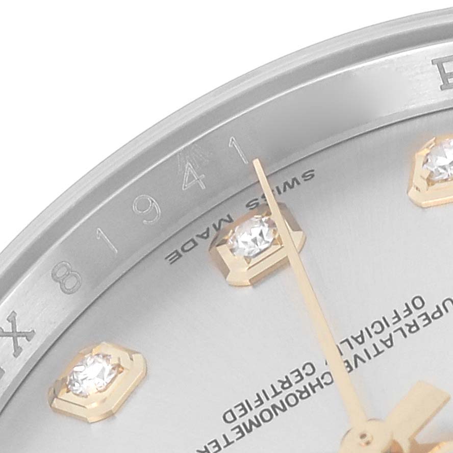 The image shows a close-up of the dial and bezel of a Rolex Datejust 116233 Men's Steel and Gold (two tone) Silver Dial 116233 Men's Steel and Gold (two tone) Silver Dial watch, highlighting the hour markers and part of the second hand.