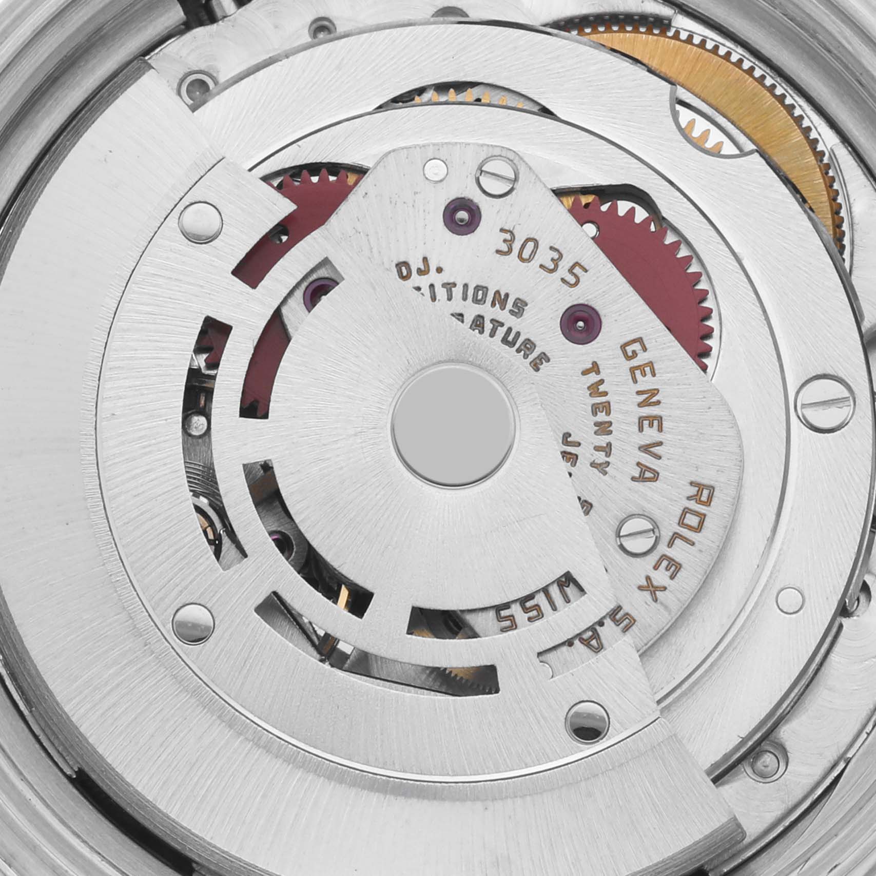 The image shows a close-up of the movement inside a Rolex Datejust 16013 Men's Steel and Gold (two tone) Champagne Dial 16013 Men's Steel and Gold (two tone) Champagne Dial watch, highlighting gears and inscriptions.