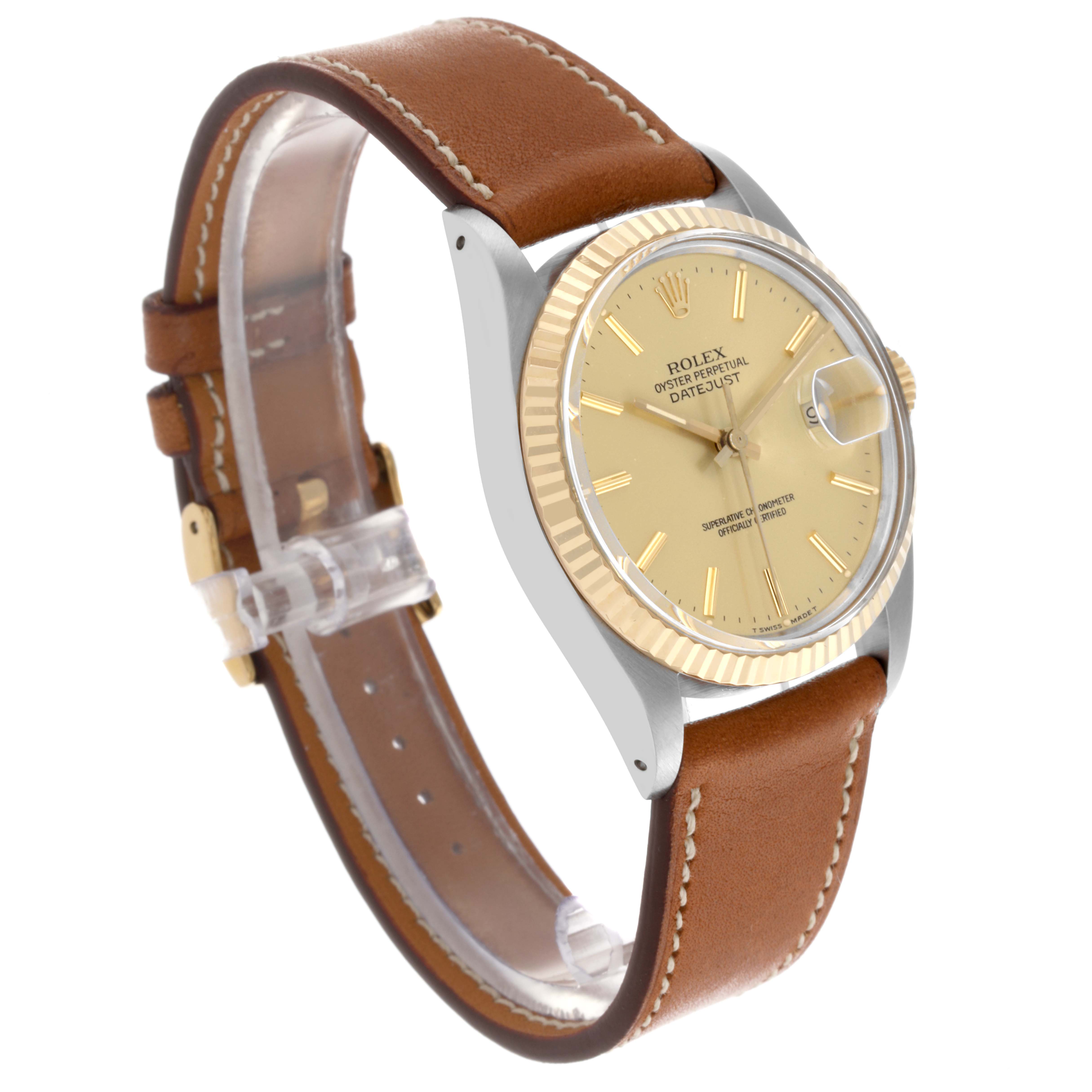 The Rolex Datejust 16013 Men's Steel and Gold (two tone) Champagne Dial 16013 Men's Steel and Gold (two tone) Champagne Dial watch is shown at an angle highlighting the face, bezel, and brown leather strap.