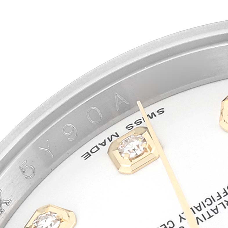 The image shows a close-up angle of the Rolex Datejust 116233 Men's Steel and Gold (two tone) White Dial 116233 Men's Steel and Gold (two tone) White Dial watch, highlighting part of the dial, hour markers, and "Swiss Made" text.