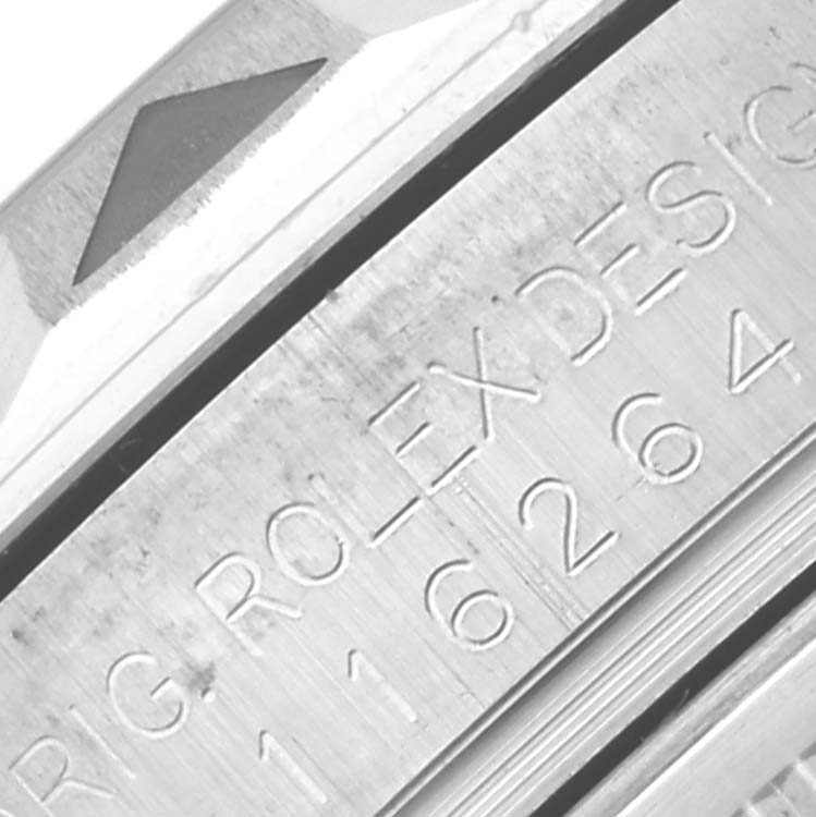 The image shows a close-up of the bezel and engraving on the Rolex Turn-o-Graph 116264 Men's Stainless Steel Black Dial 116264 Men's Stainless Steel Black Dial model.