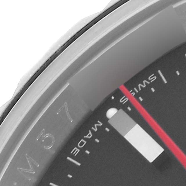 The image shows a close-up of the bezel and dial edge of a Rolex Turn-o-Graph 116264 Men's Stainless Steel Black Dial 116264 Men's Stainless Steel Black Dial, highlighting the indices and text.