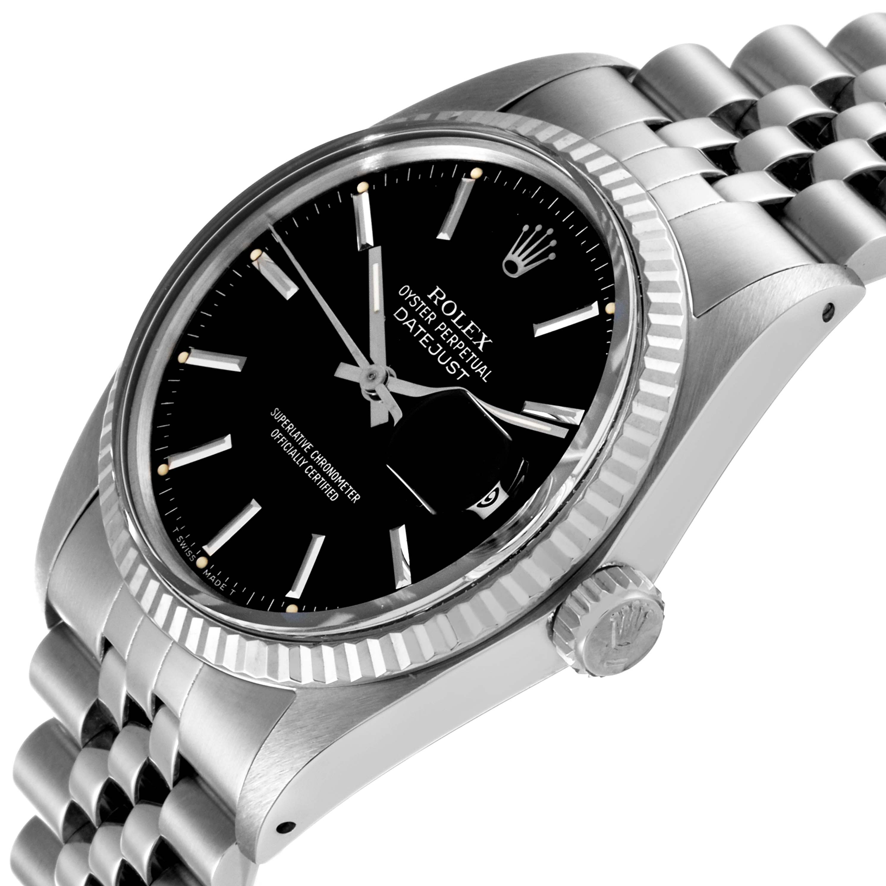 This image shows a Rolex Datejust 16014 Men's Stainless Steel Black Dial 16014 Men's Stainless Steel Black Dial watch with a black dial and a Jubilee bracelet, photographed from an angled side view.