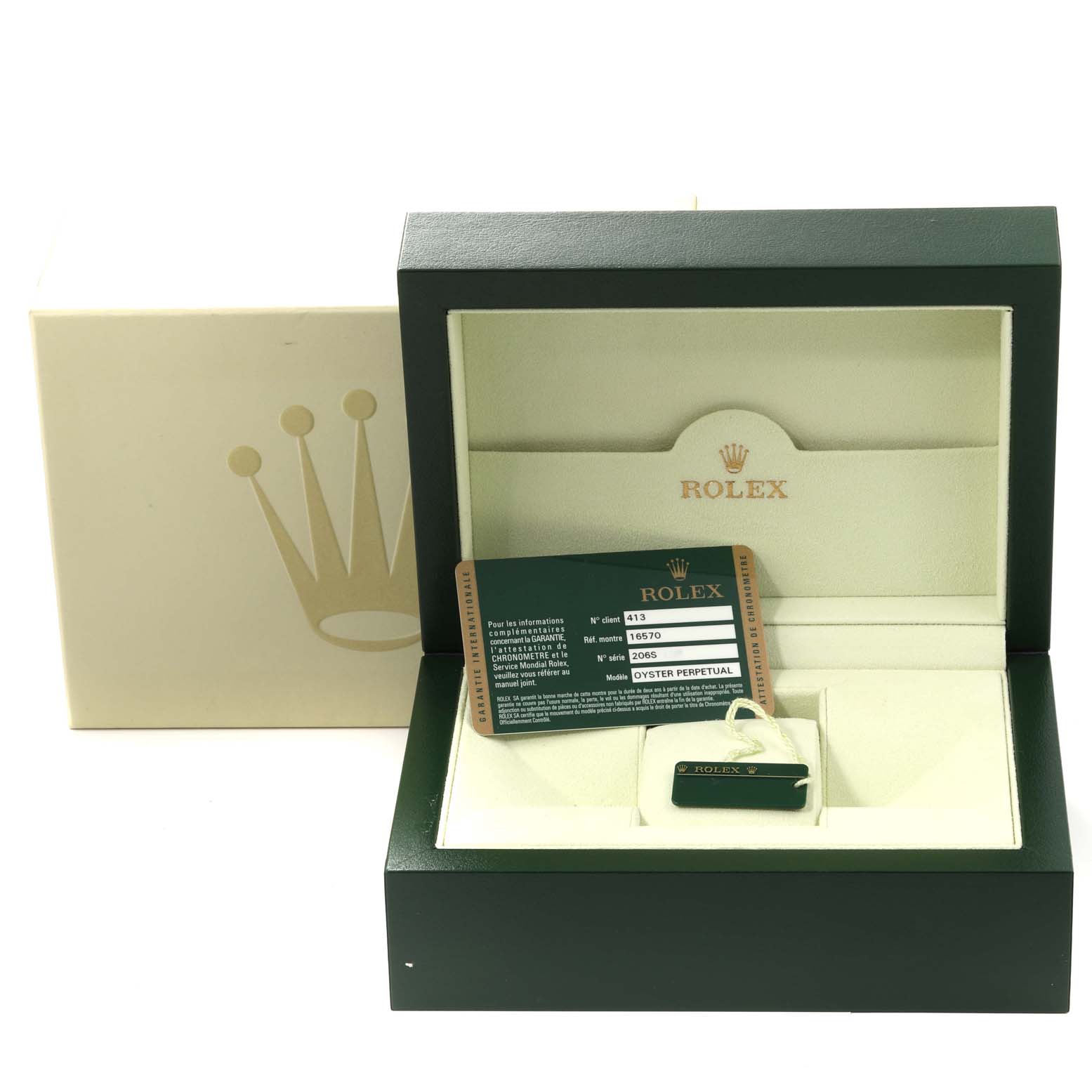 This image shows the packaging, warranty card, and tag for the Rolex Explorer 16570T Men's Stainless Steel Black Dial 16570T Men's Stainless Steel Black Dial model, but not the watch itself.