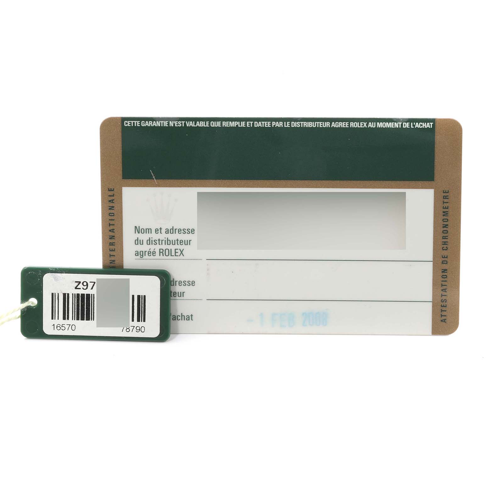 This image shows the warranty card and green tag for the Rolex Explorer 16570T Men's Stainless Steel Black Dial 16570T Men's Stainless Steel Black Dial model.