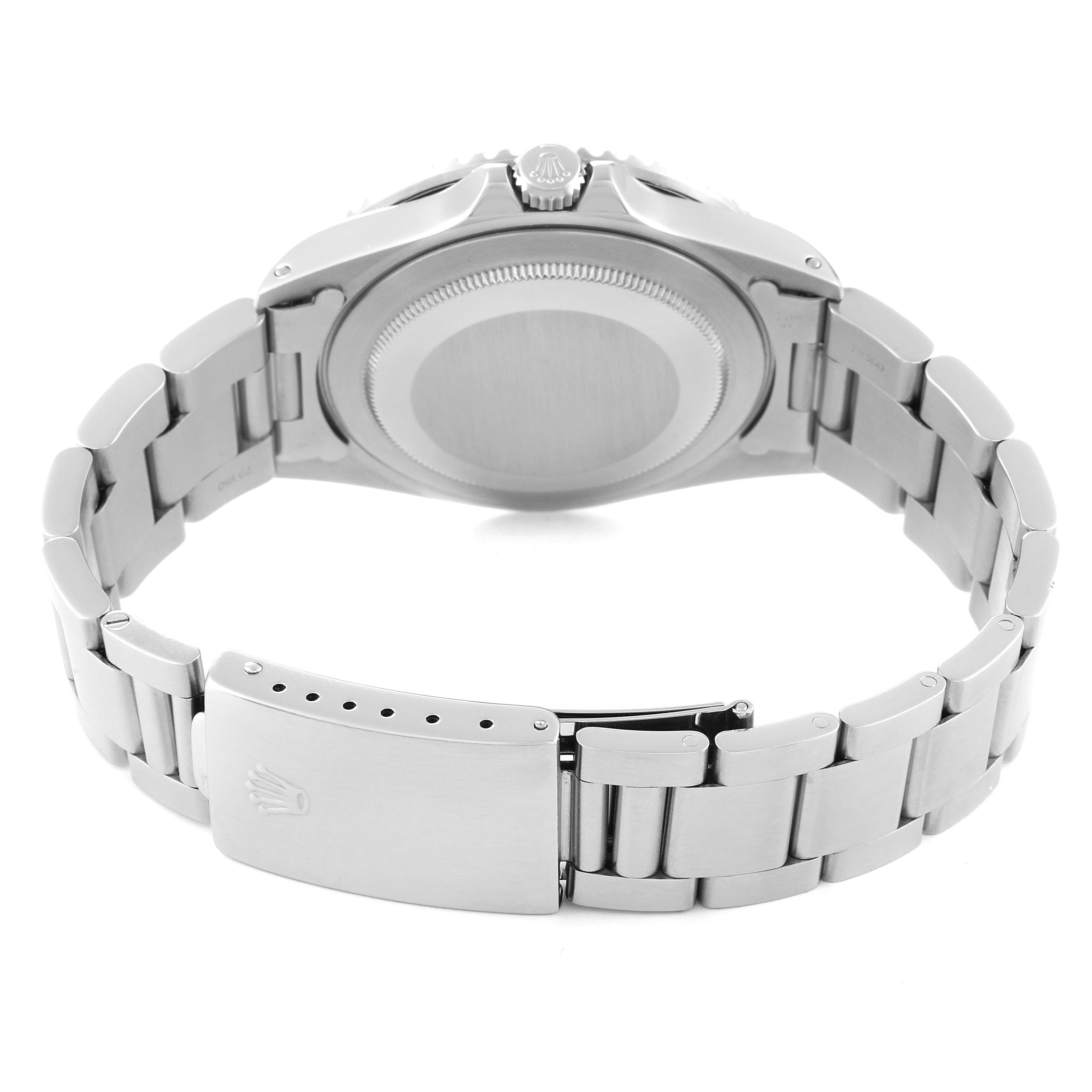 The image shows the back view of a Rolex GMT-Master 16700 Men
s Stainless Steel Black Dial 16700 Men
s Stainless Steel Black Dial watch, highlighting the case back, crown, and bracelet clasp.