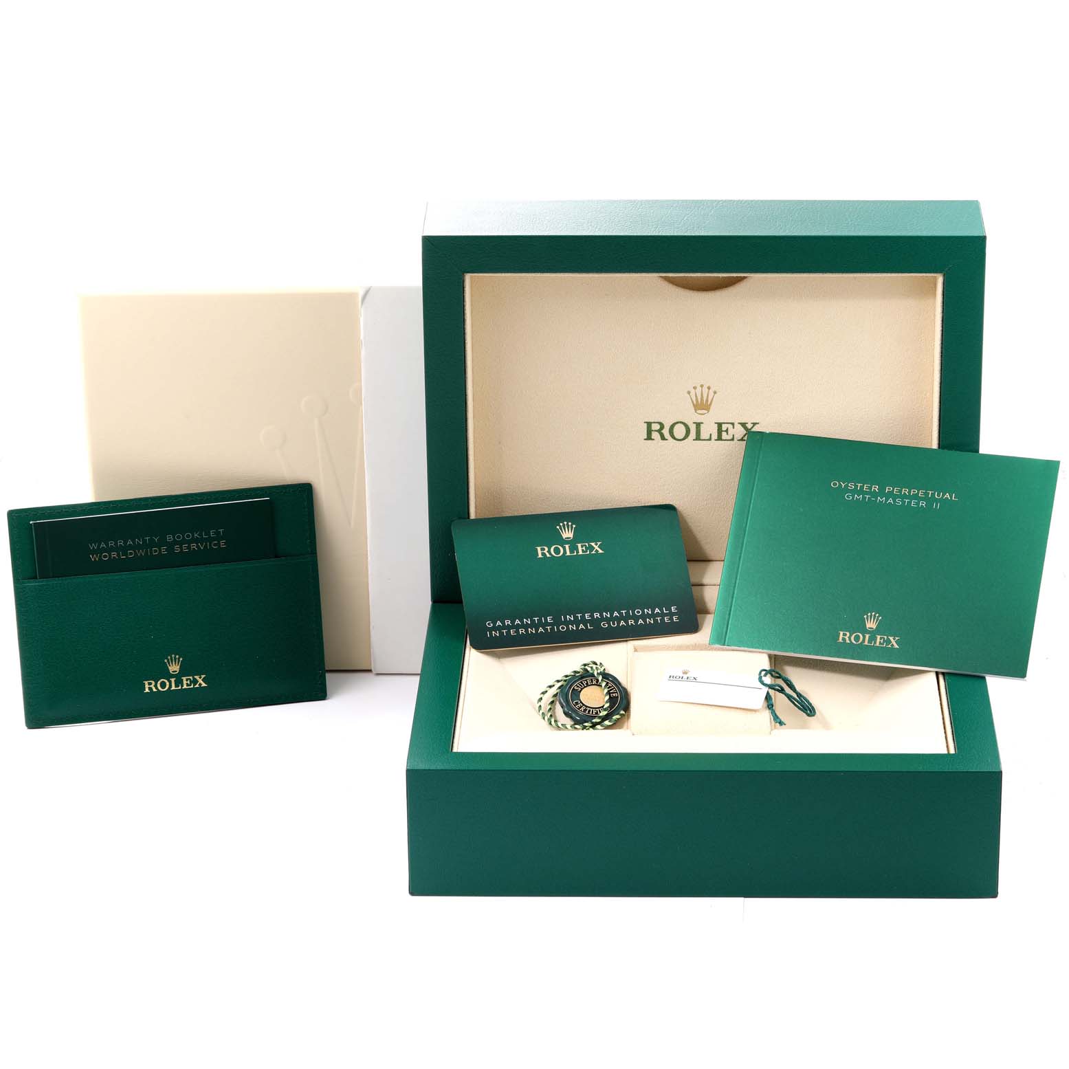 This image shows the box and accessories of a Rolex GMT-Master 126715CHNR Men
s Rose Gold Black Dial 126715CHNR Men
s Rose Gold Black Dial watch, including booklets, a tag, and a warranty card.