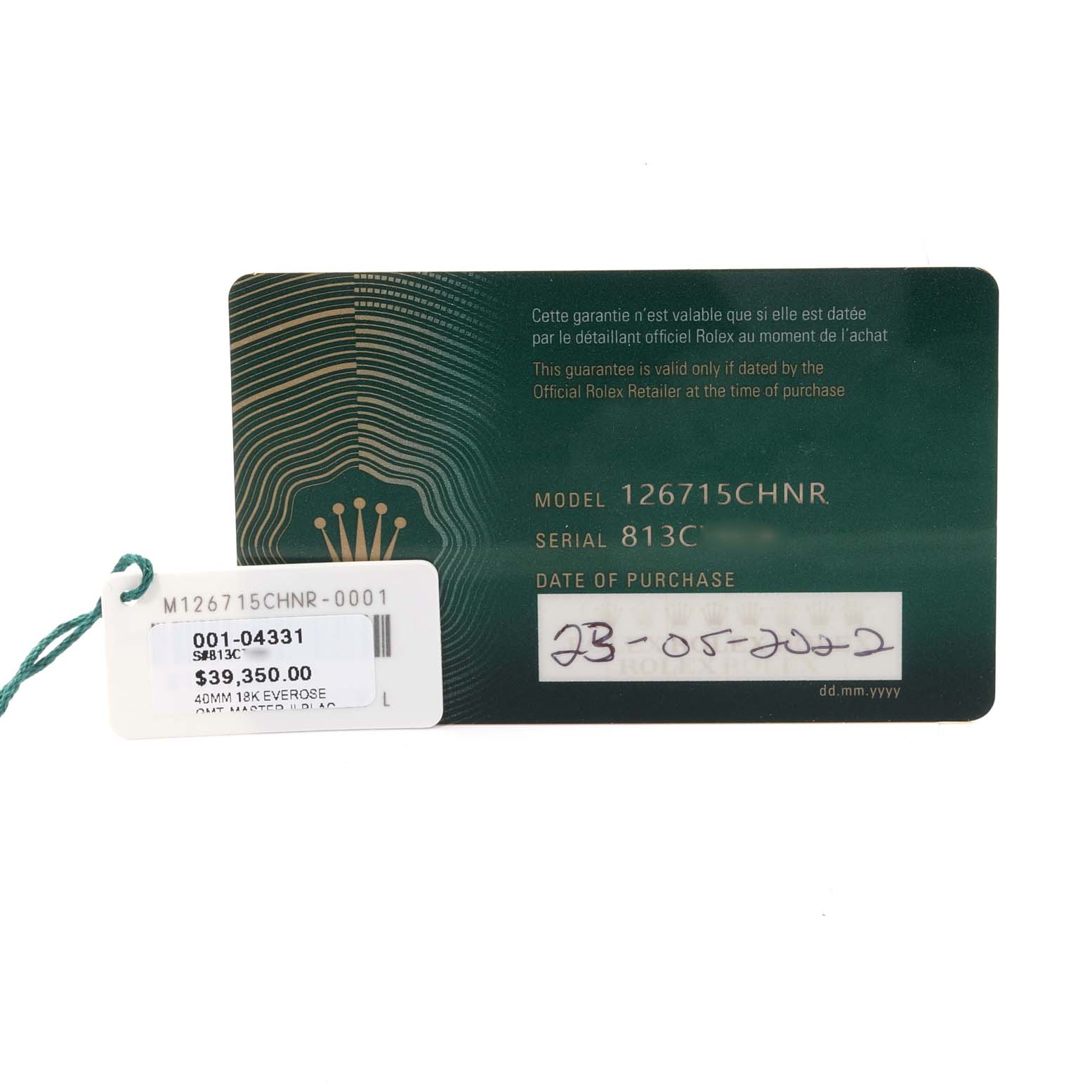The image shows the warranty card and price tag for a Rolex GMT-Master 126715CHNR Men
s Rose Gold Black Dial 126715CHNR Men
s Rose Gold Black Dial model 126715CHNR watch.