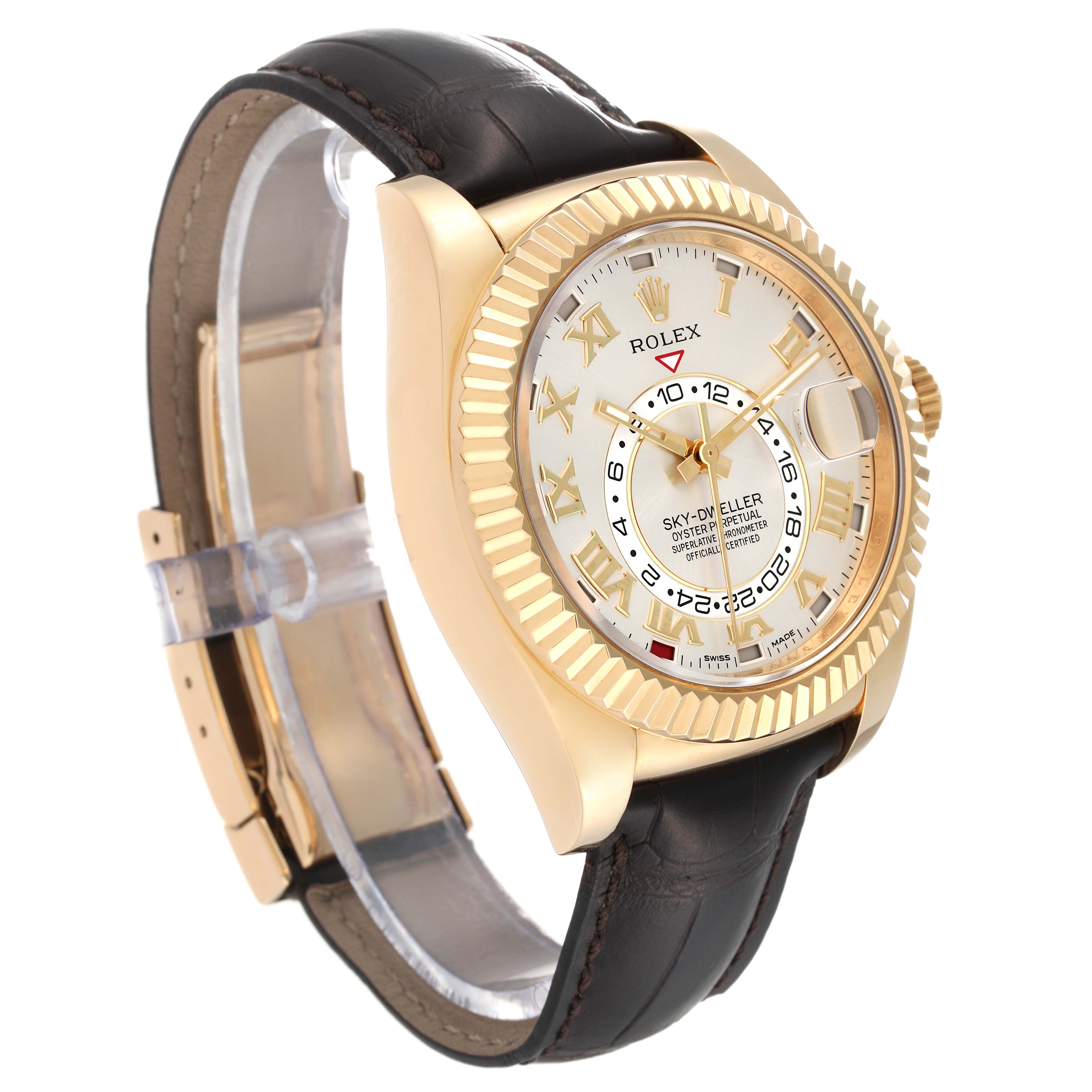 The Rolex Sky-Dweller 326138 Men's Yellow Gold Silver Dial 326138 Men's Yellow Gold Silver Dial watch is shown at a 3/4 angle, displaying the dial, case, bezel, strap, and clasp.