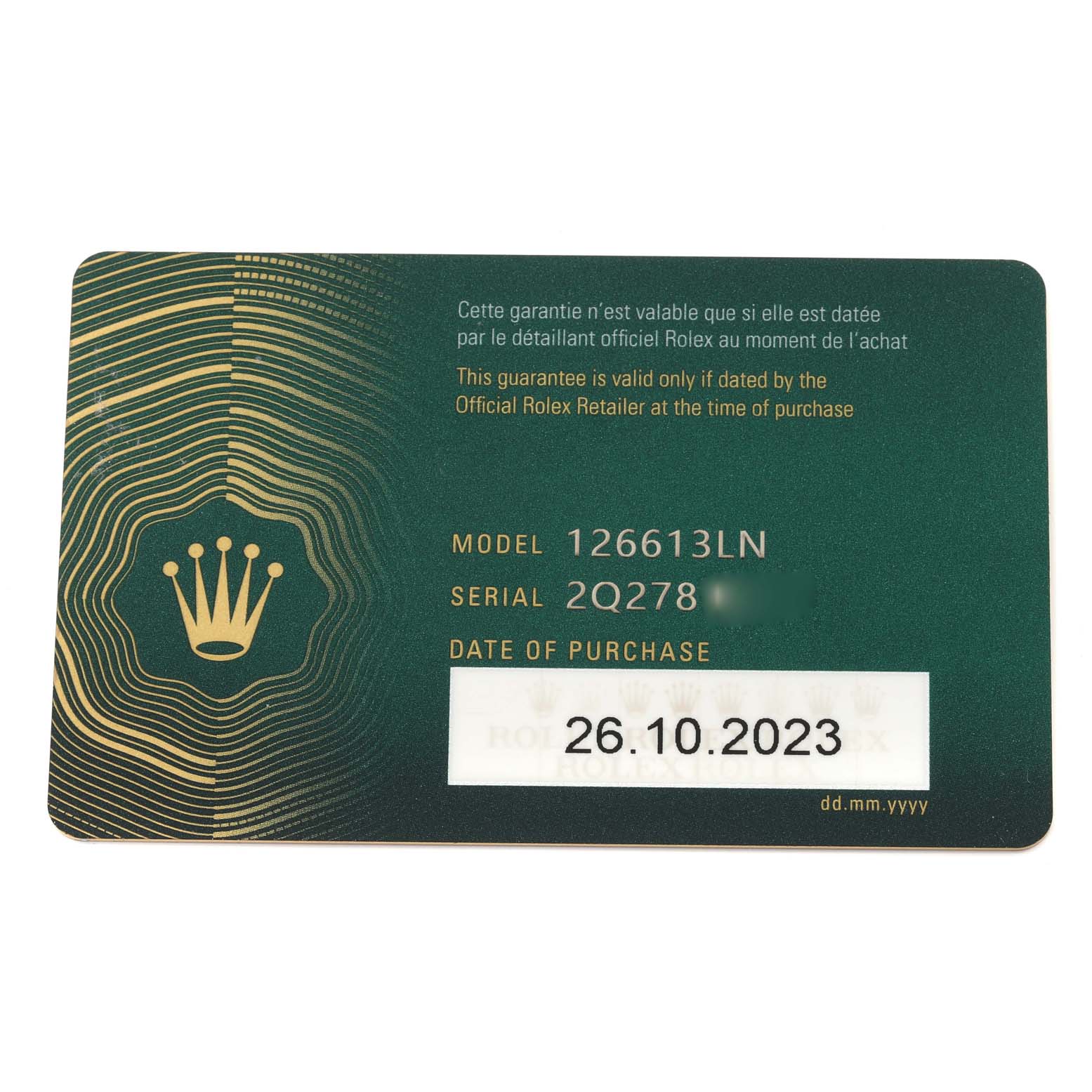 This is an image of a guarantee card for a Rolex Submariner 126613LN Men
s Steel and Gold (two tone) Black Dial 126613LN Men
s Steel and Gold (two tone) Black Dial model 126613LN, showing its serial number and date of purchase.