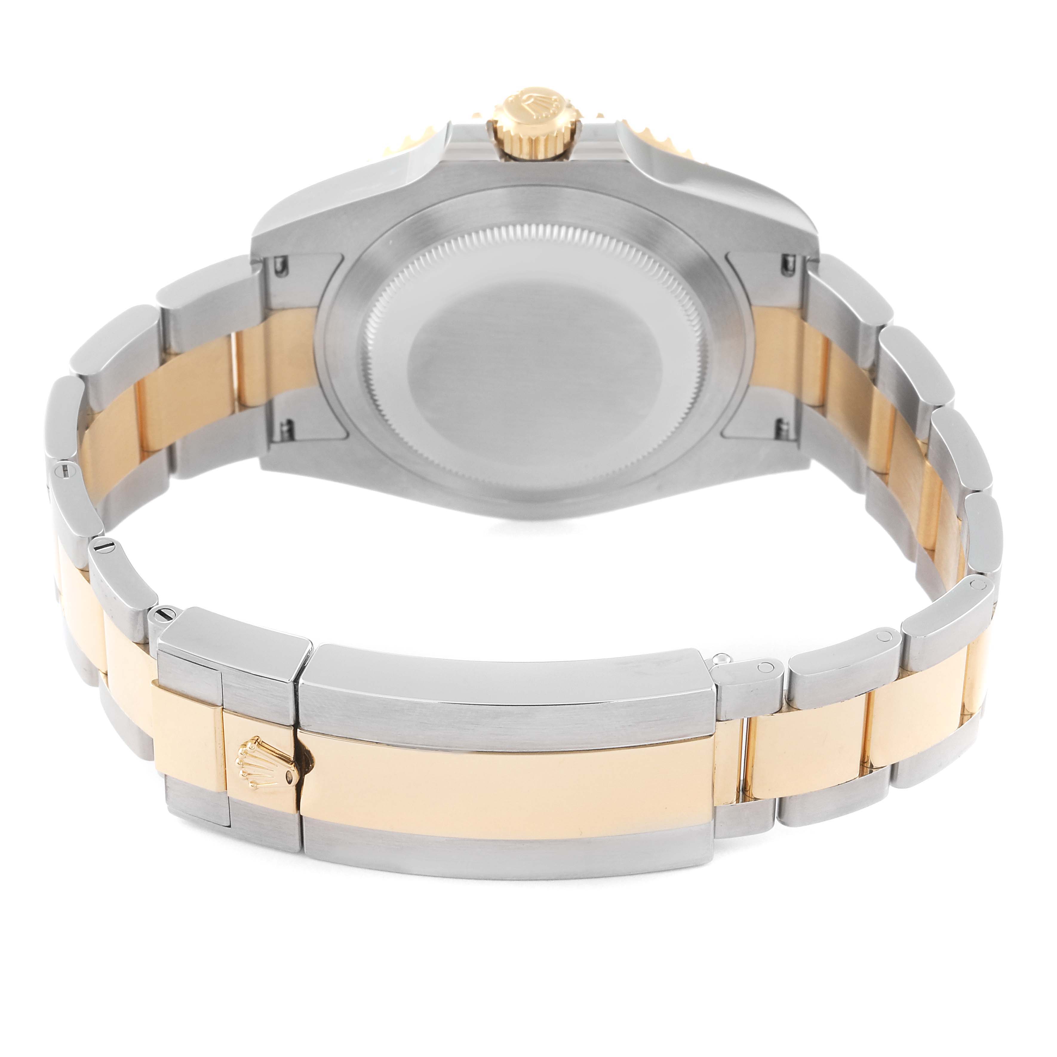 This image shows the back and bracelet of a Rolex Submariner 126613LN Men
s Steel and Gold (two tone) Black Dial 126613LN Men
s Steel and Gold (two tone) Black Dial watch, highlighting the clasp and the case back.