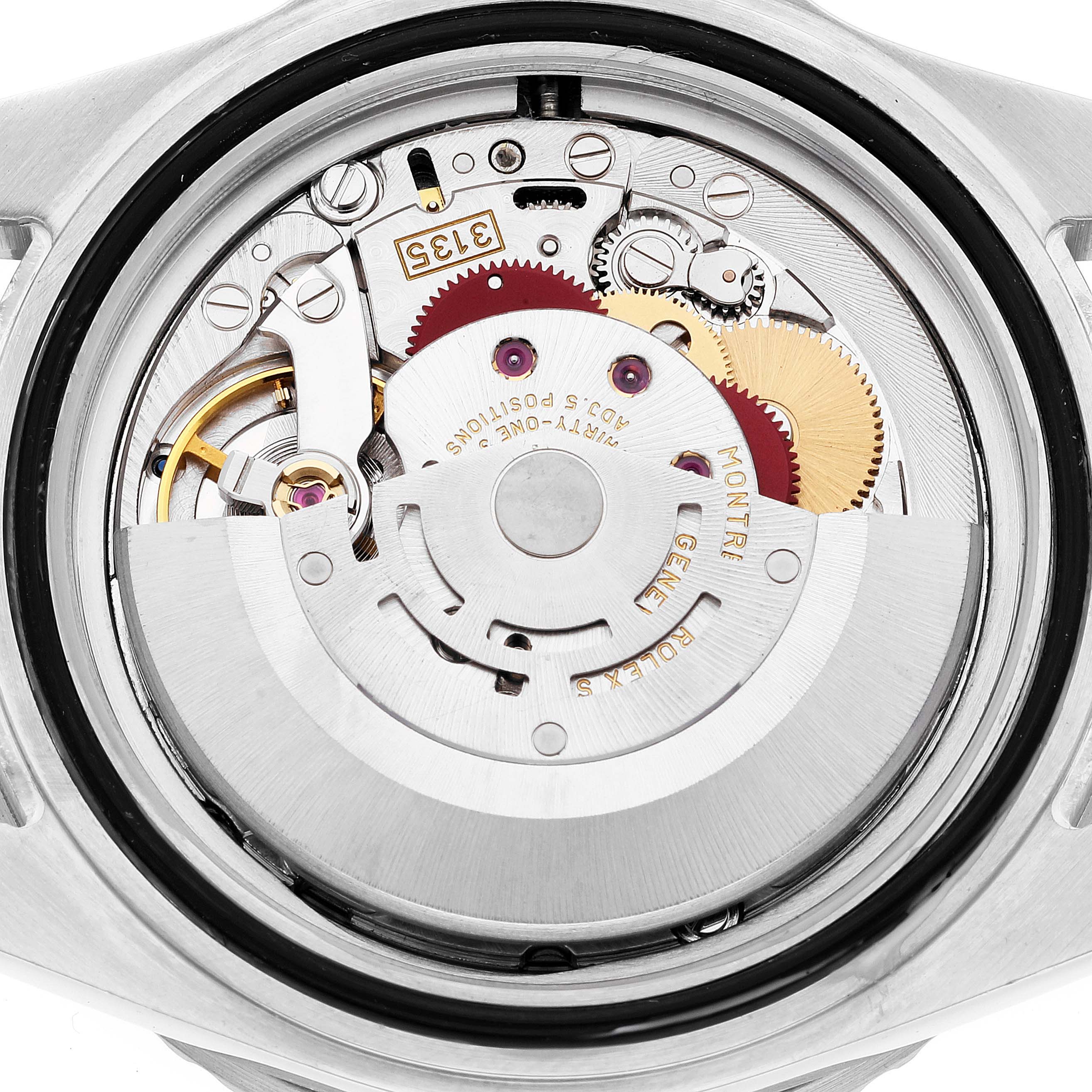 This image shows the internal mechanism of a Rolex Submariner 16610 Men
s Stainless Steel Black Dial 16610 Men
s Stainless Steel Black Dial watch from a back view, revealing gears and rotors.