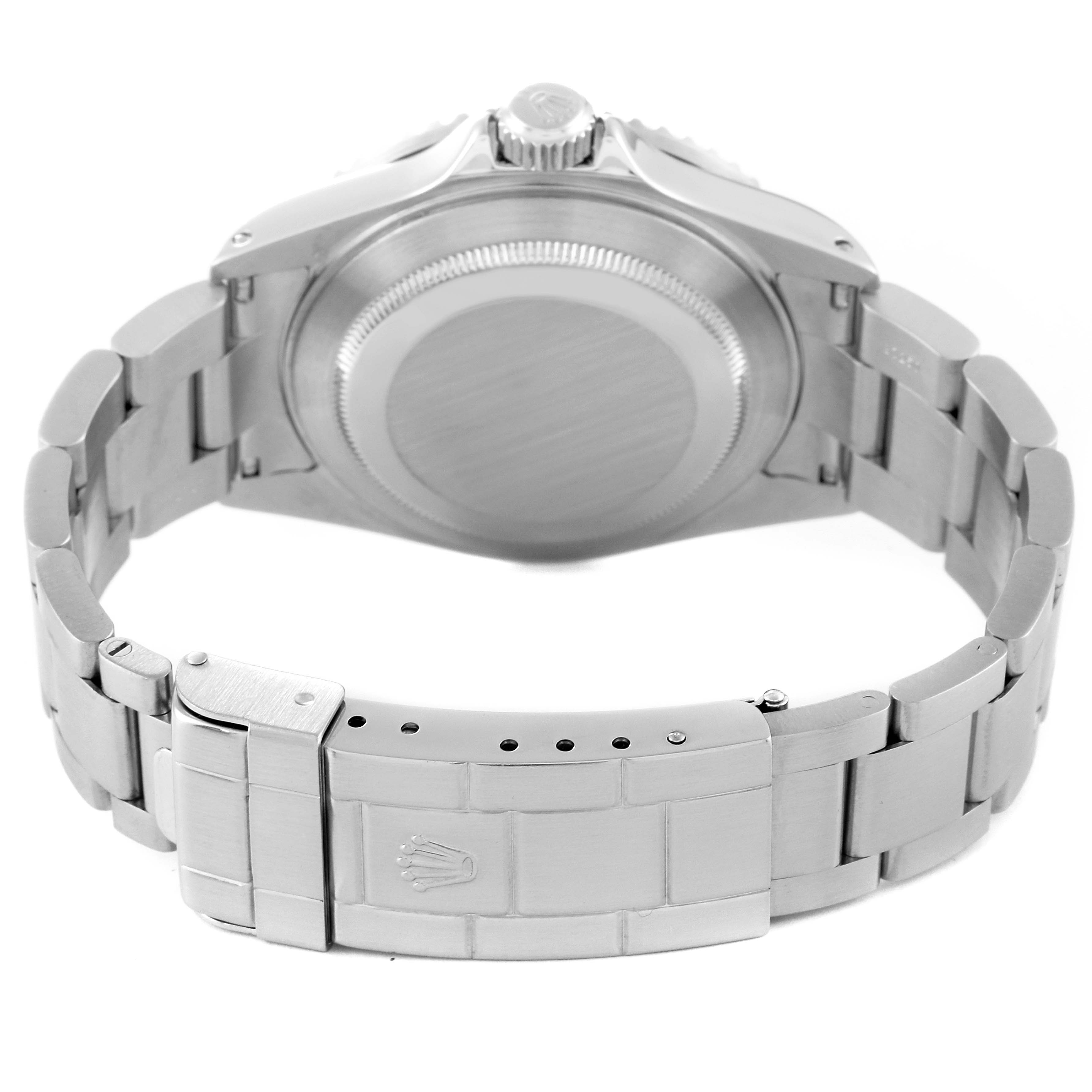 The image shows the back view of a Rolex Submariner 16610 Men
s Stainless Steel Black Dial 16610 Men
s Stainless Steel Black Dial watch, highlighting the case back and part of the metal bracelet with the clasp.