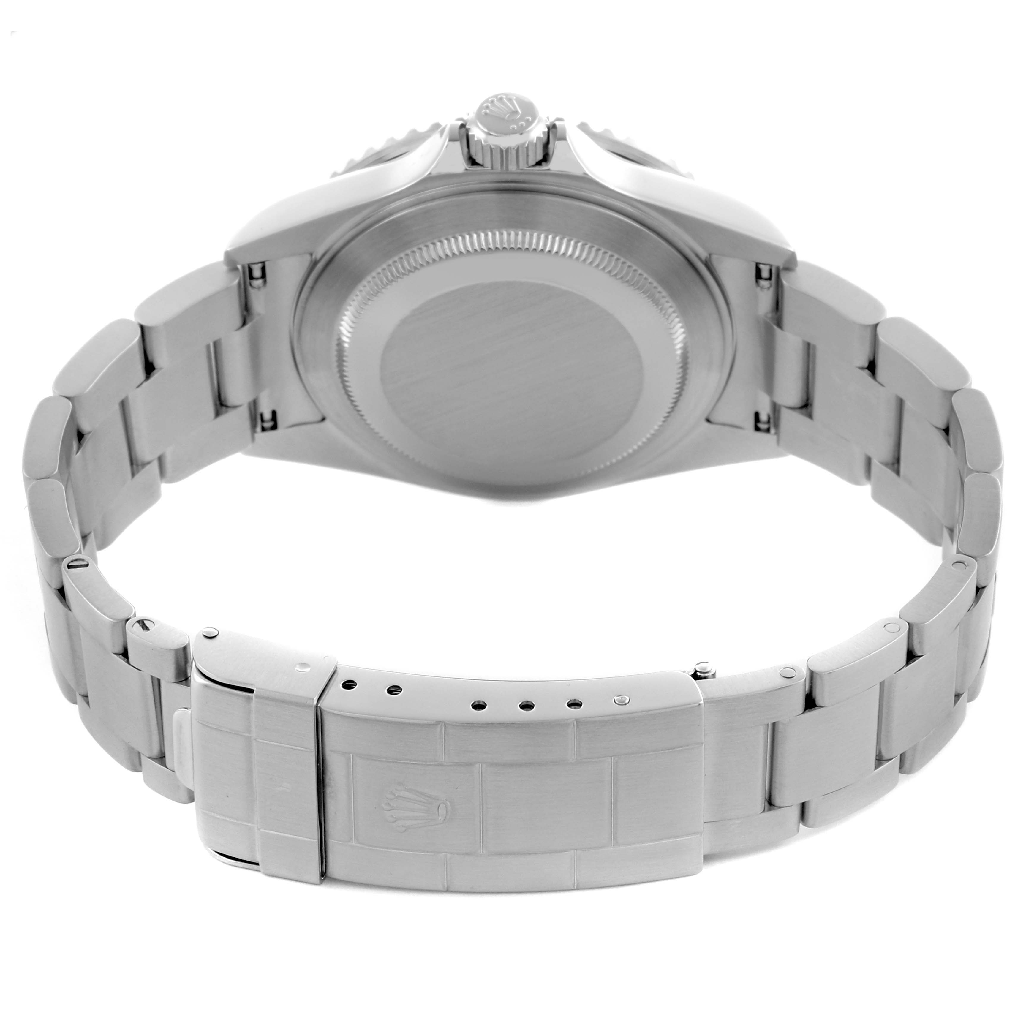 The image shows the back of a Rolex Submariner 16610 Men's Stainless Steel Black Dial 16610 Men's Stainless Steel Black Dial, highlighting the case back and bracelet clasp.