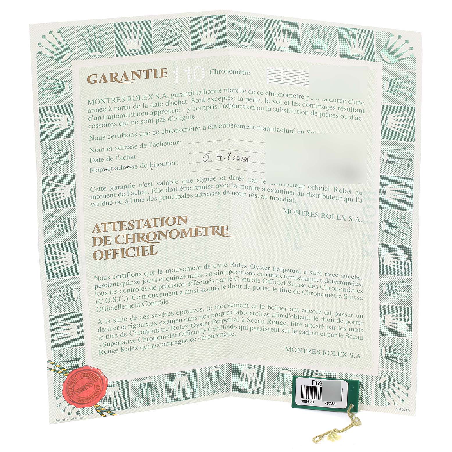 This image shows a warranty certificate for the Rolex Yacht-Master 169623 Women's Steel and Gold (two tone) White Dial 169623 Women's Steel and Gold (two tone) White Dial model from an above angle.